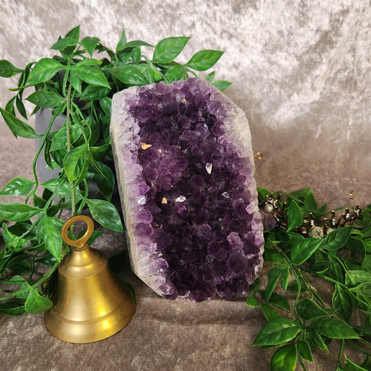 Large amethyst crystal cluster showing rich violet druzy formation