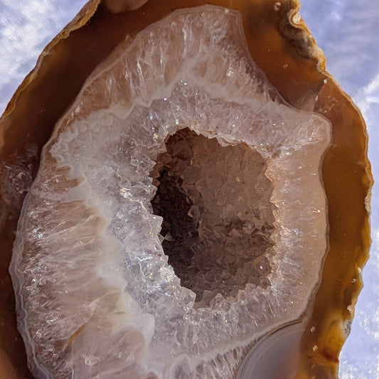 close up of natural red agate geode with stunning quartz druzy feature