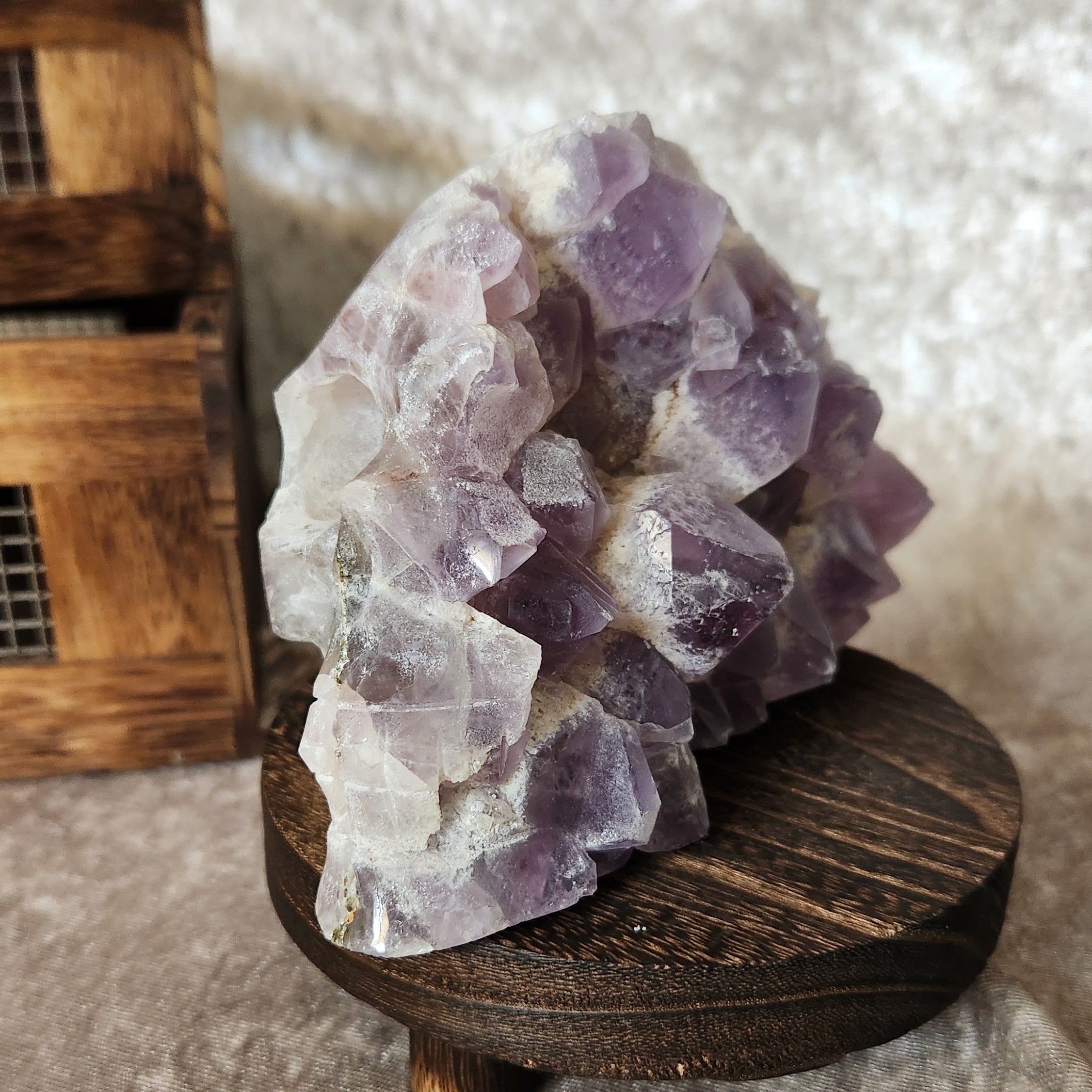 Collector’s amethyst skull carving showcasing natural crystal texture