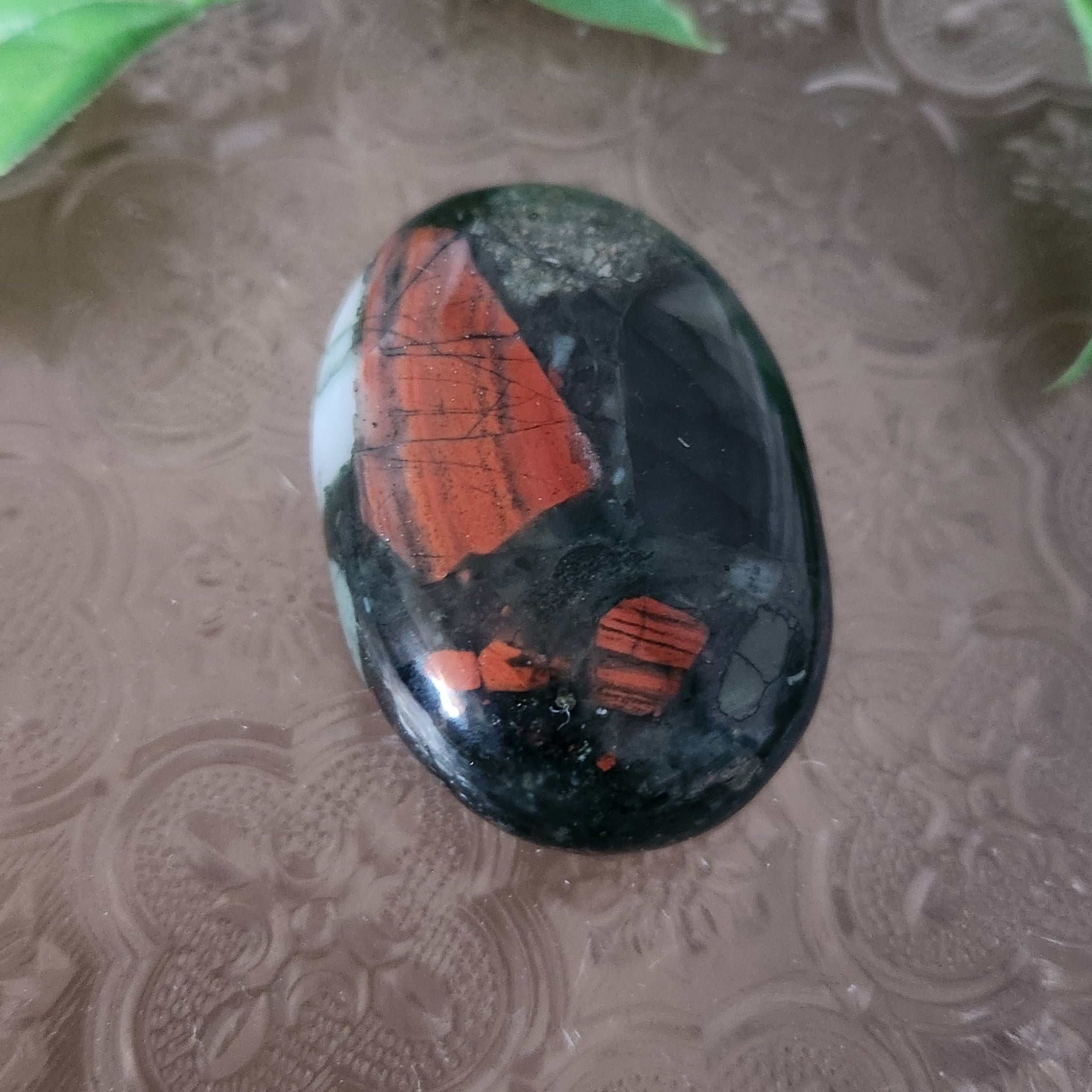 African Bloodstone palmstone for protection, strength and vital life energy