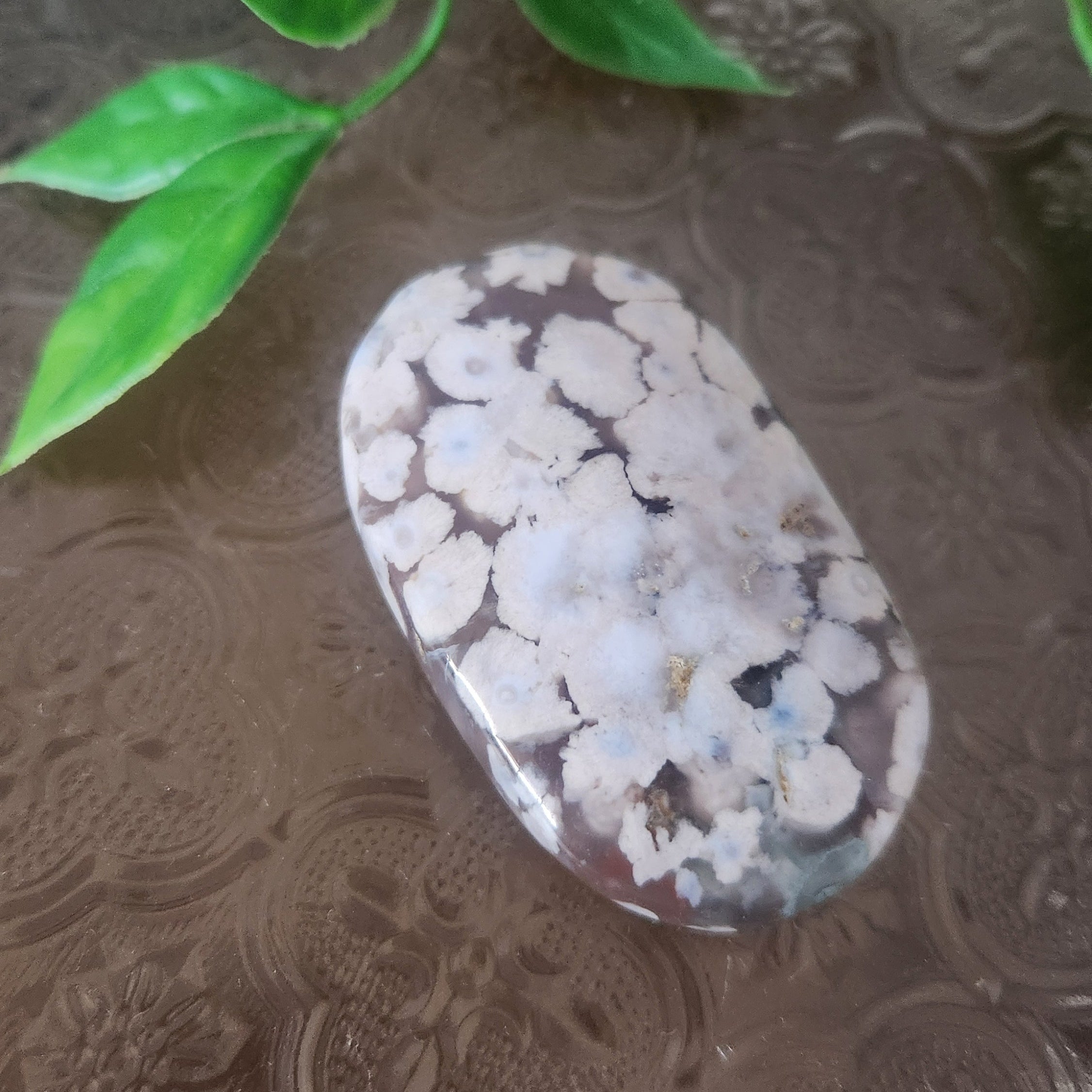 Flower Agate palmstone for growth, emotional healing and heart-led transformation
