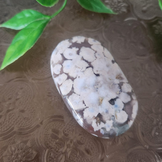Flower Agate palmstone for growth, emotional healing and heart-led transformation