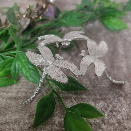 Silver dragonfly crystal stand for displaying a sphere — statement decor