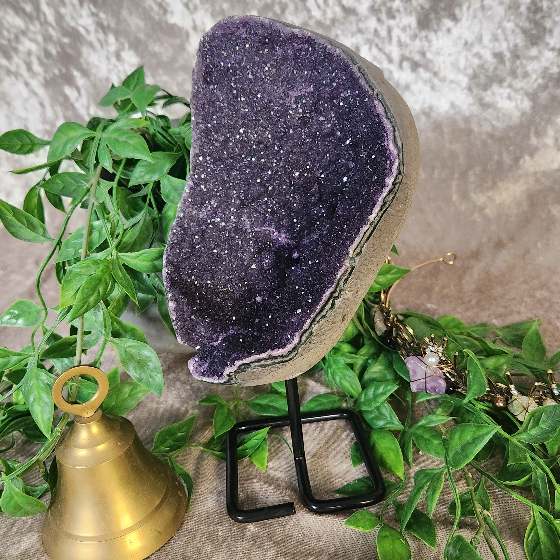 Galaxy Amethyst is like sparkling stars displayed on metal stand