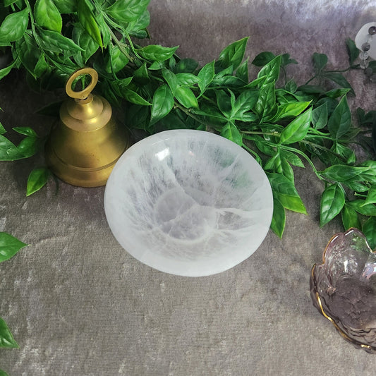Natural Satin Spar selenite bowl used for crystal cleansing and charging