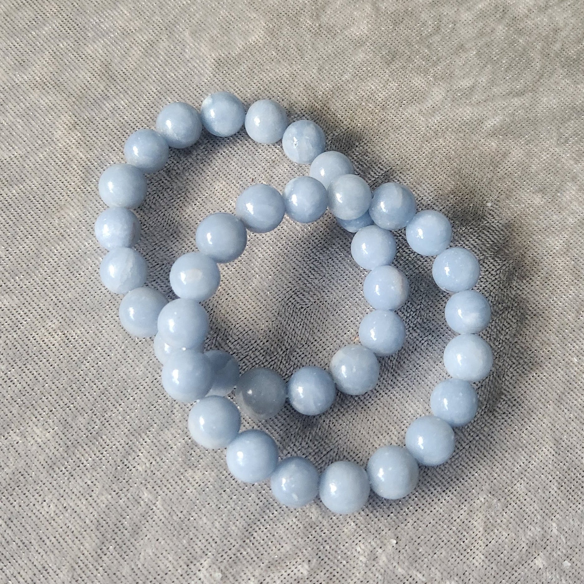 Natural Angelite bracelet displayed on a neutral background