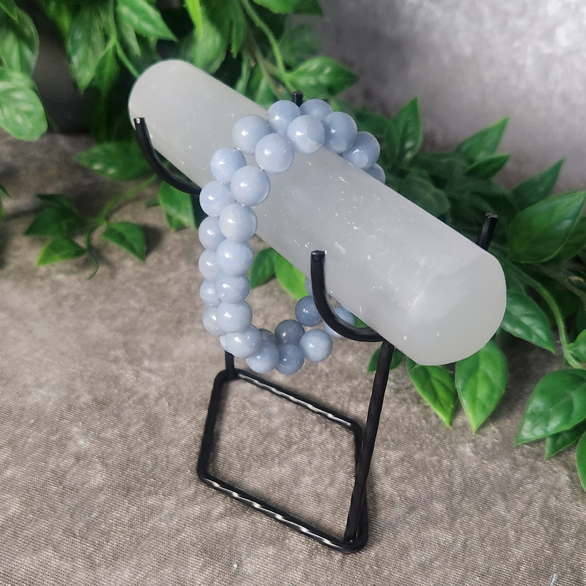 Angelite bracelet with smooth pale blue 10 mm beads on stretch elastic