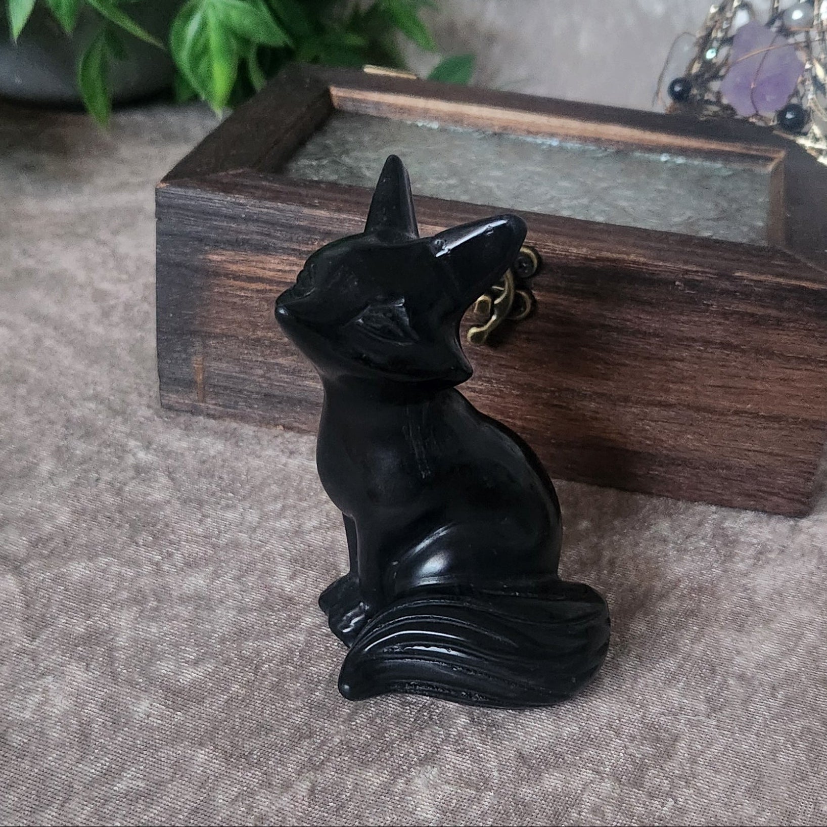 Hand-carved crystal fox figurine representing cleverness, intuition and protective energy