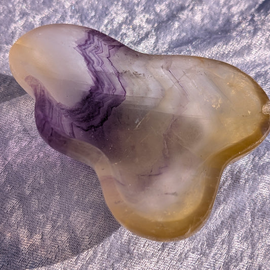 Candy fluorite crystal bowl showing green and purple banding, used for clarity, focus and emotional balance