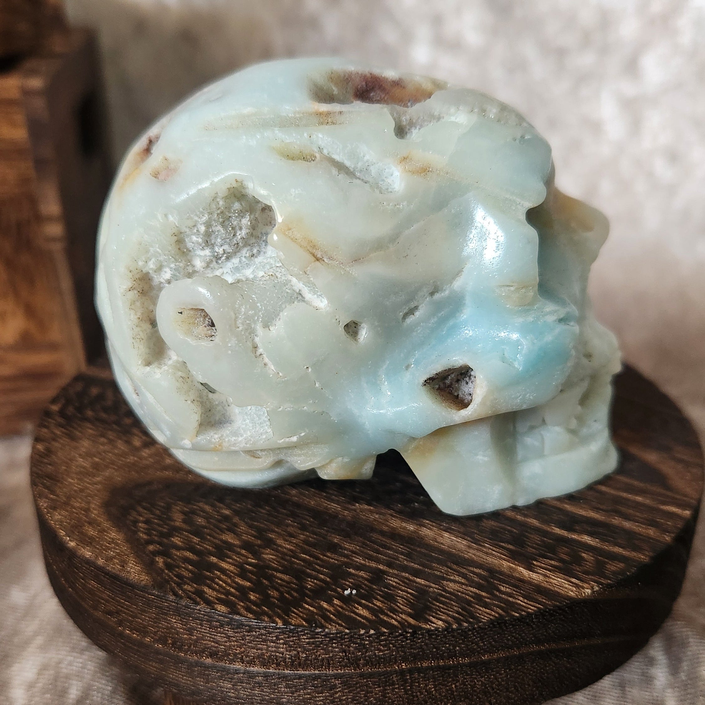 Hand-carved Caribbean calcite skull with calming colour tones
