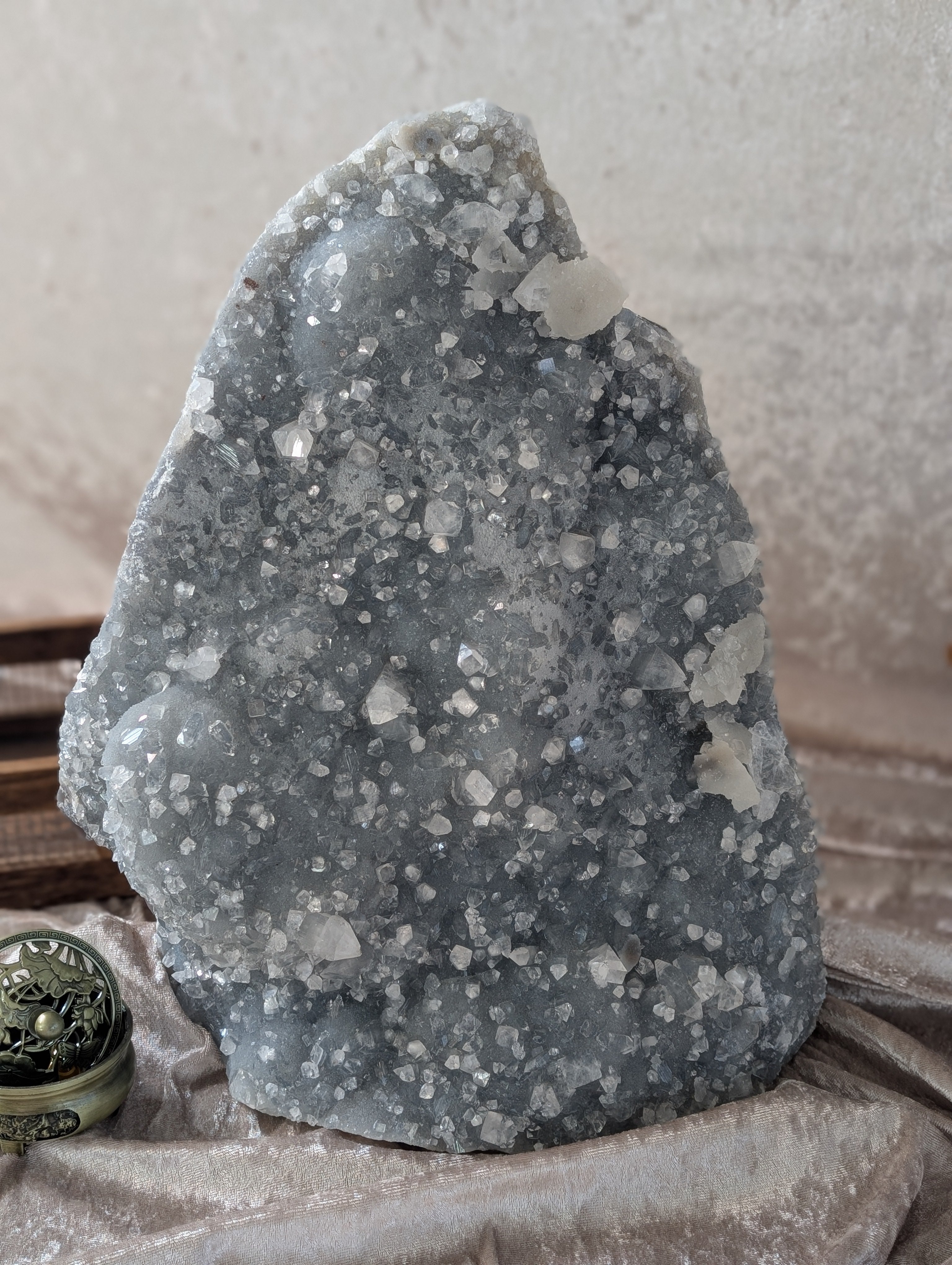 Collectors Dream Chalcedony with Apophyllite and Zeolite sparkling crystal displayed on champagne colored velvet