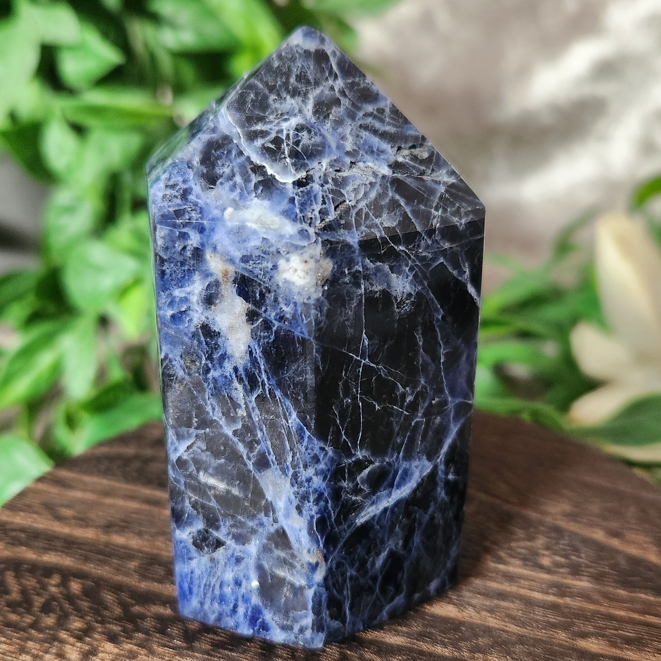 Sodalite tower featuring rich blue tones with natural white veining and a smooth polished finish