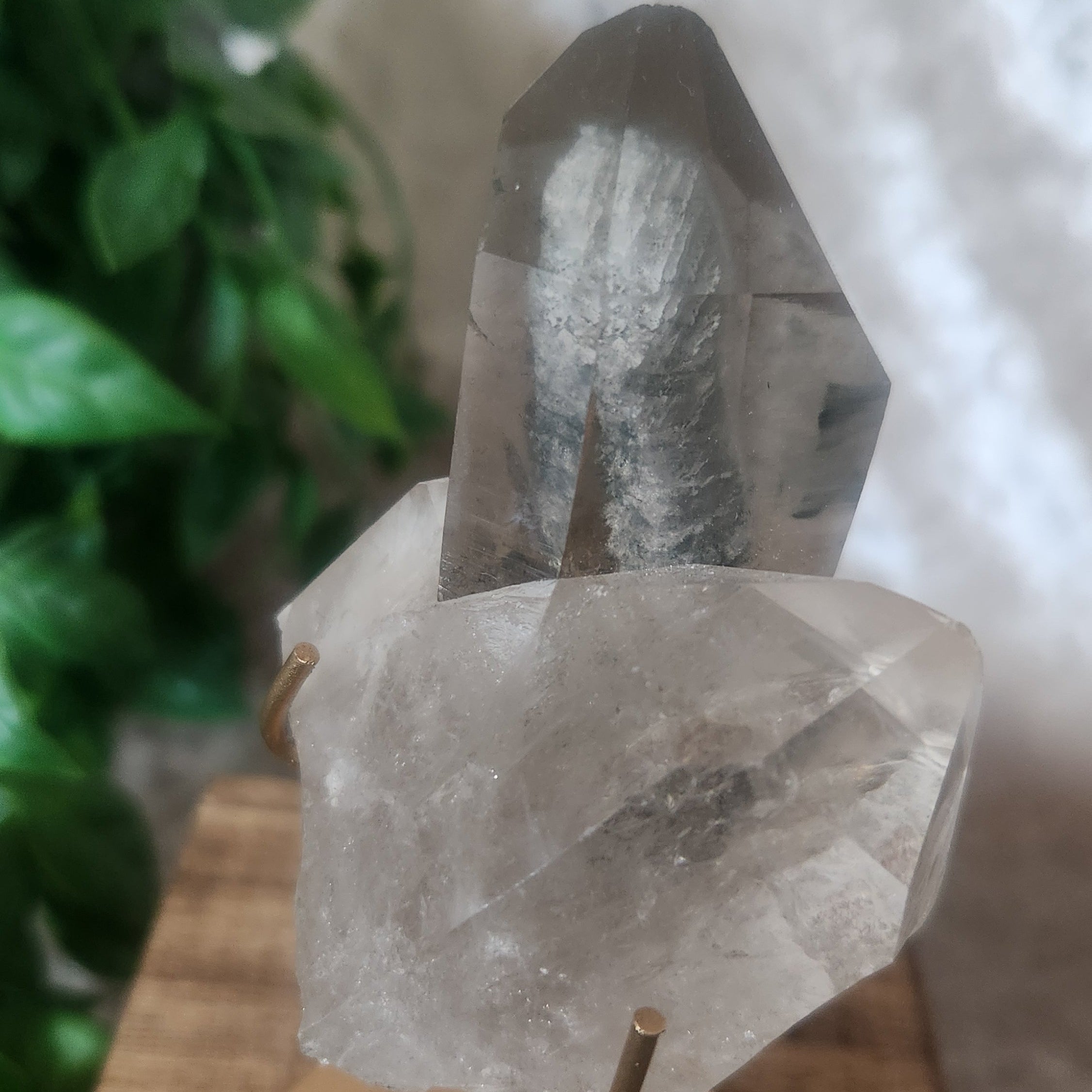 Clear Brazilian quartz crystal with visible blue internal formation