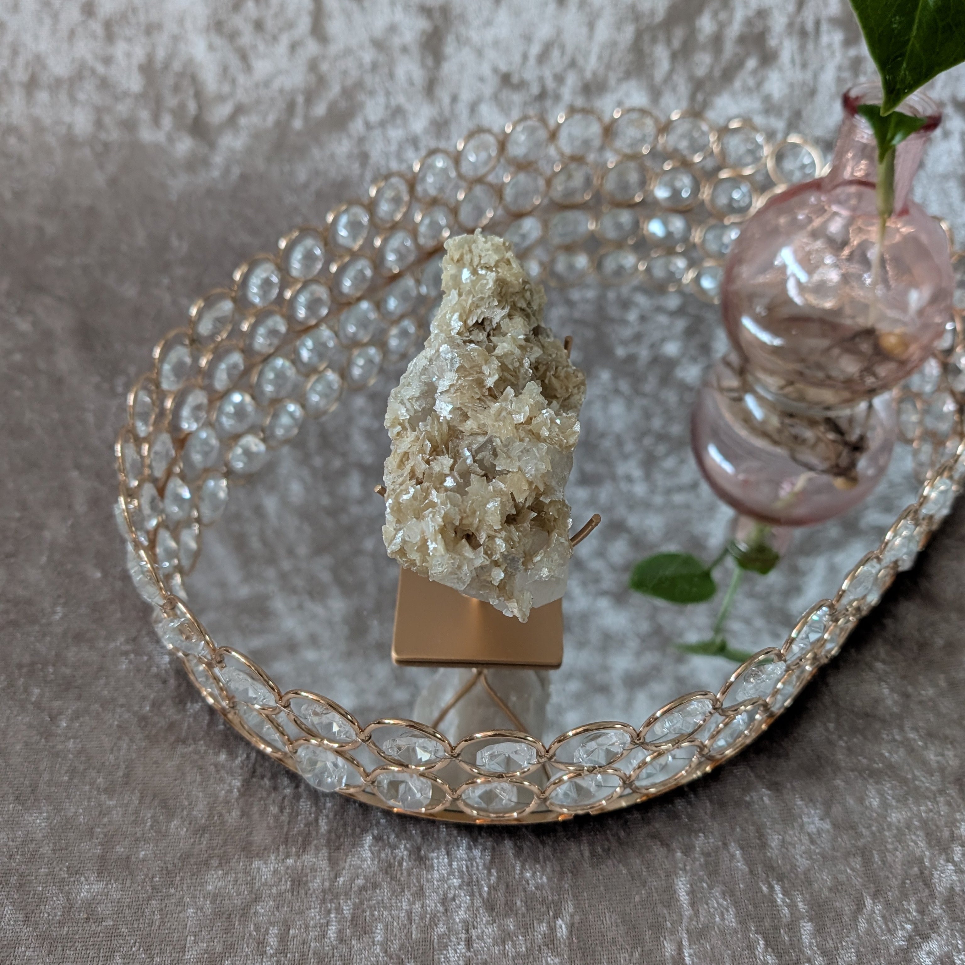 Brazilian clear quartz crystal with shimmering muscovite mica plates