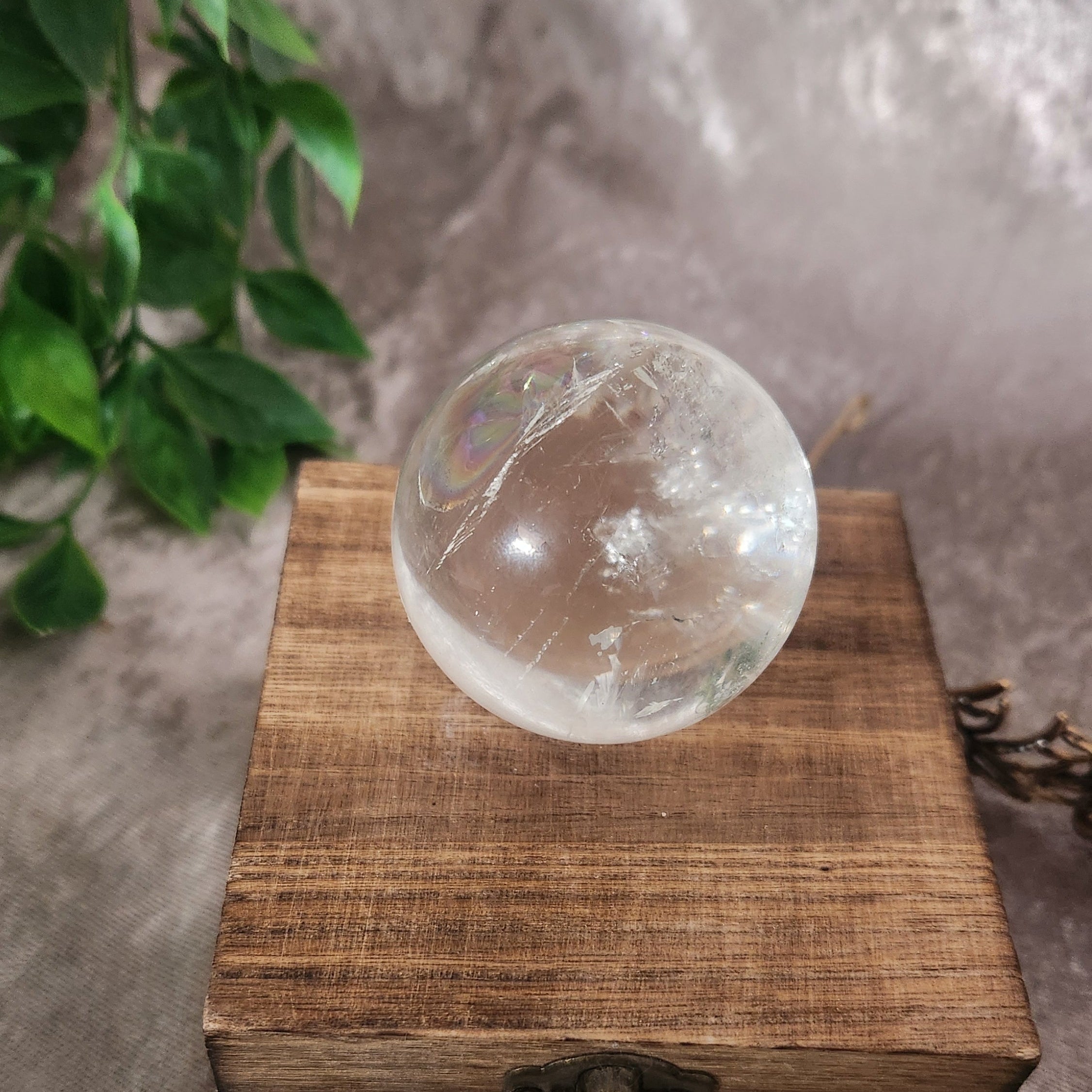 Natural clear quartz sphere with smooth high-polish finish