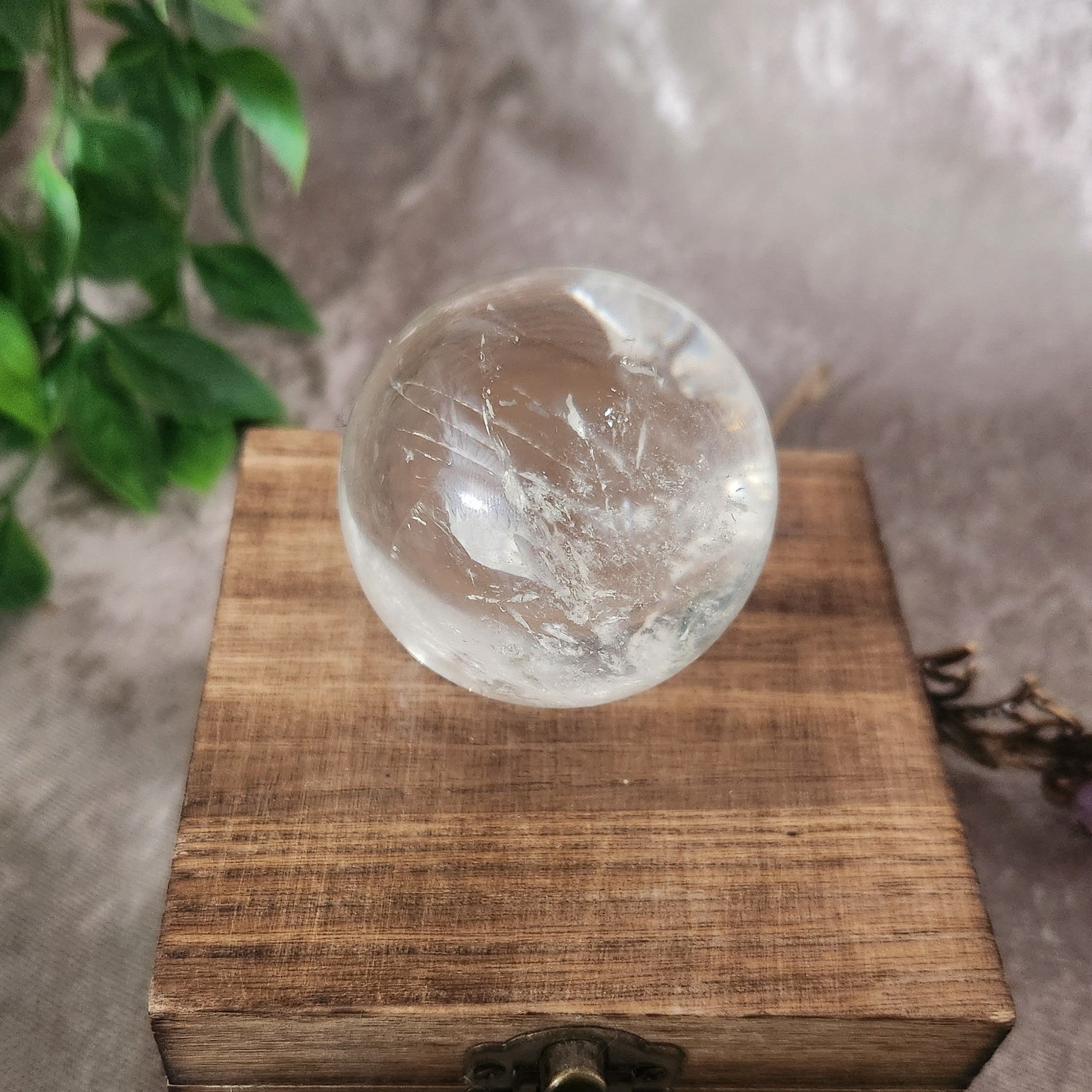 Transparent clear quartz sphere with subtle internal veils