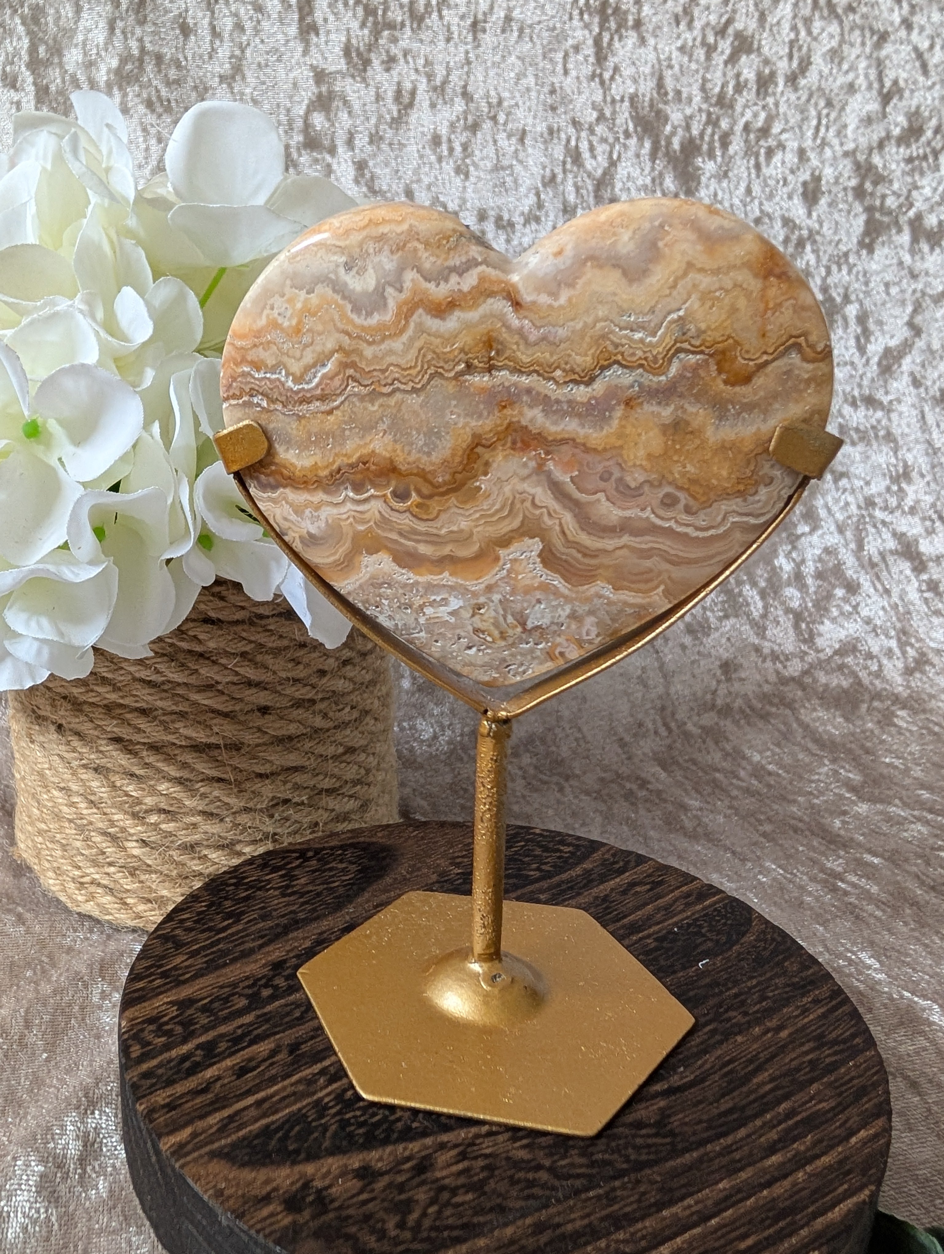 Crazy Lace Heart on gold stand in neutral waves with touches of blush pink on wooden stand