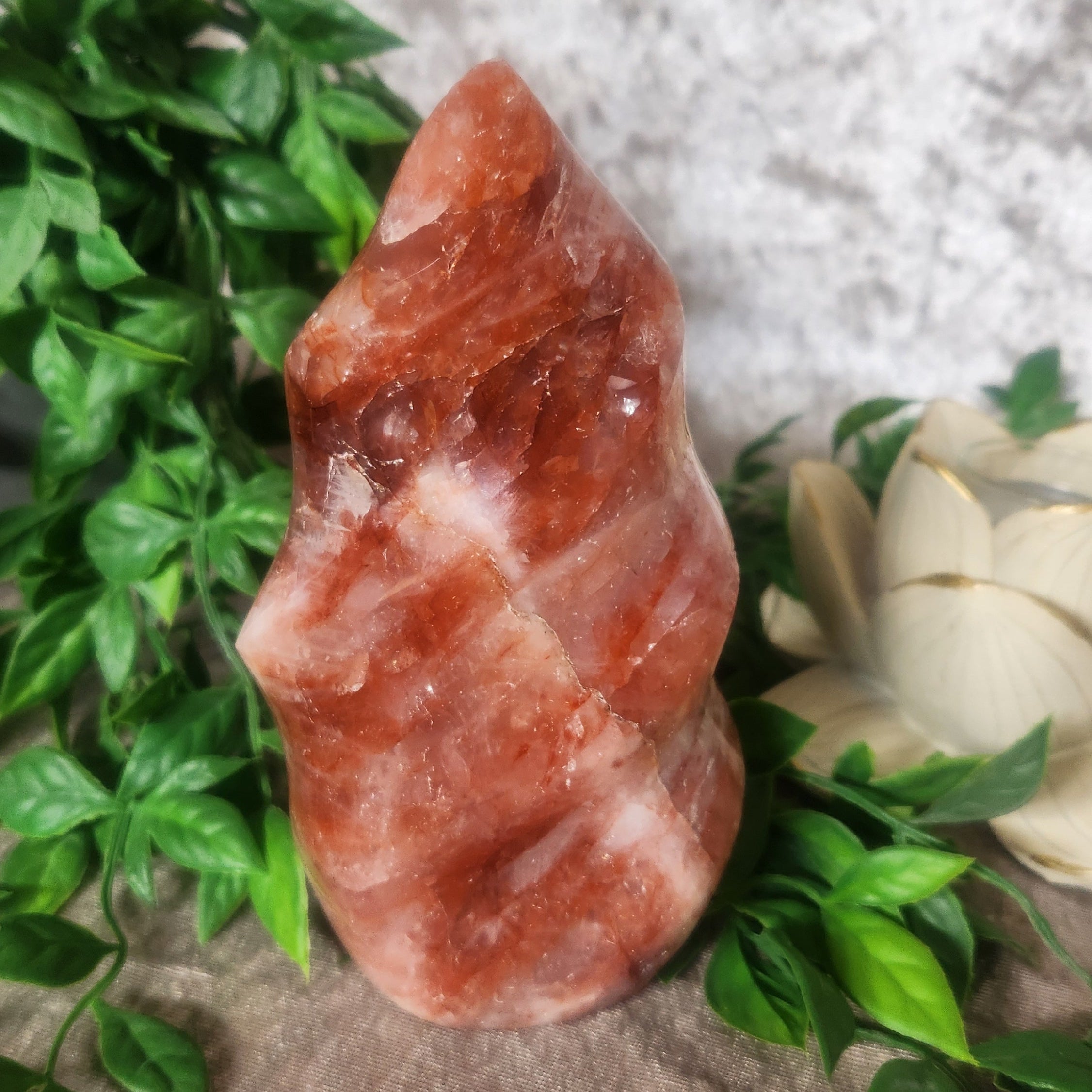Fire Quartz Crystal Flame over 1kg displayed on velvet background