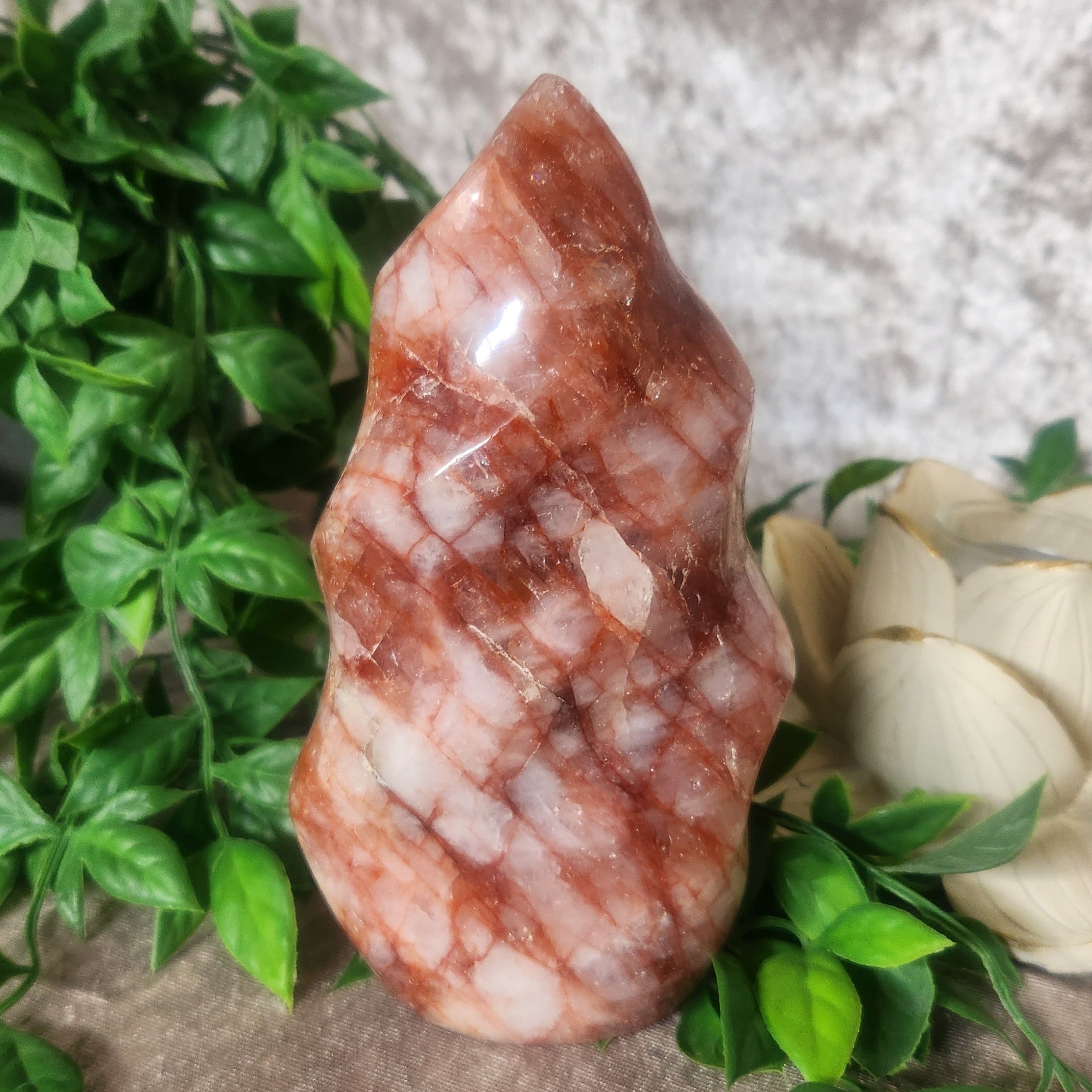 Fire Quartz Crystal Flame over 1kg displayed on velvet background