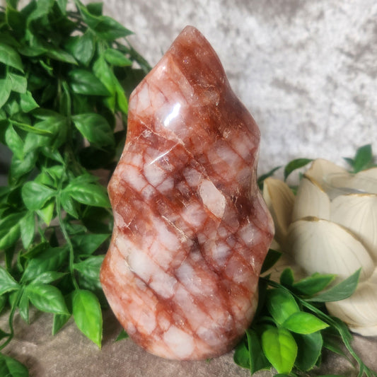 Fire Quartz Crystal Flame over 1kg displayed on velvet background
