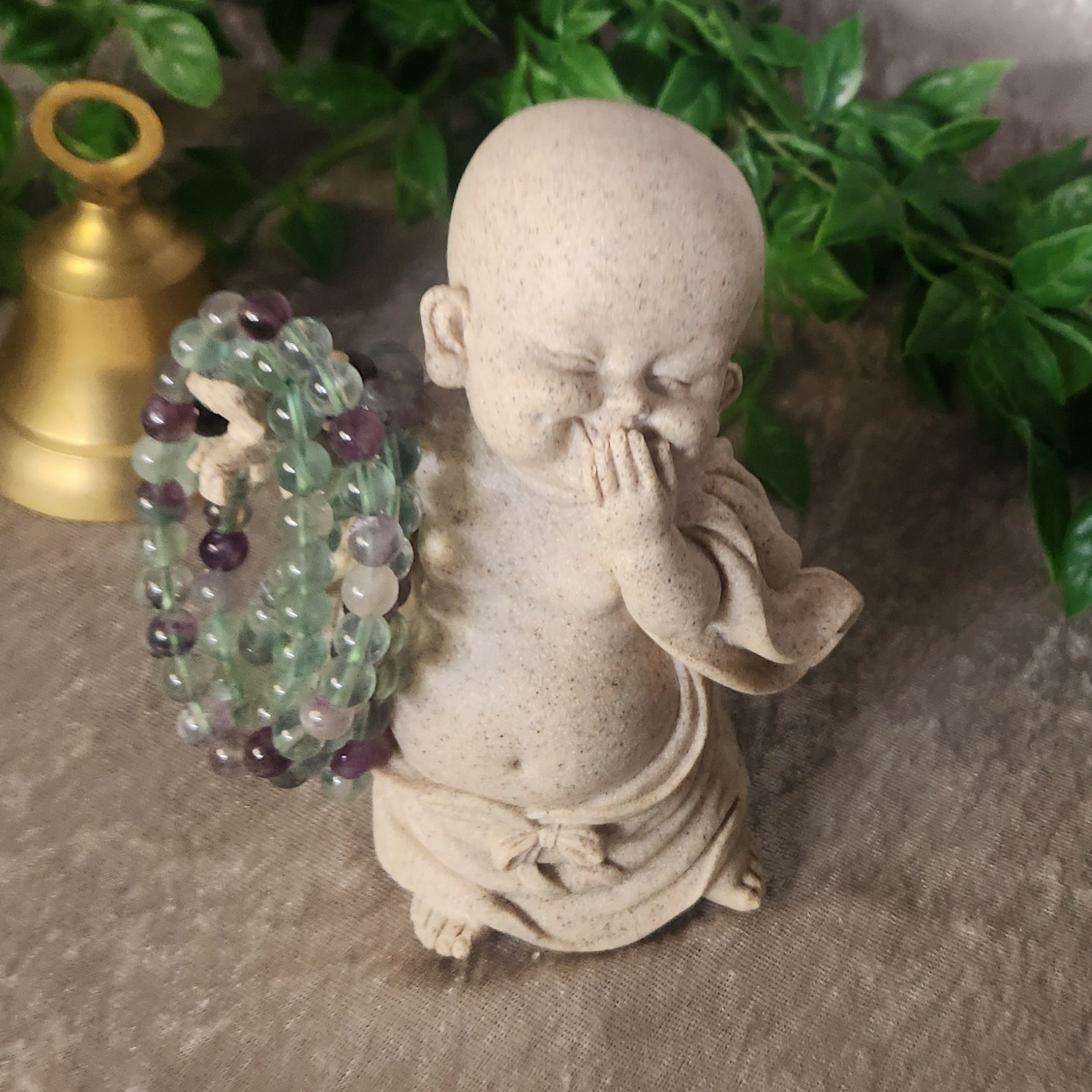 Fluorite bracelet with polished 8 mm beads in soft natural colour variations