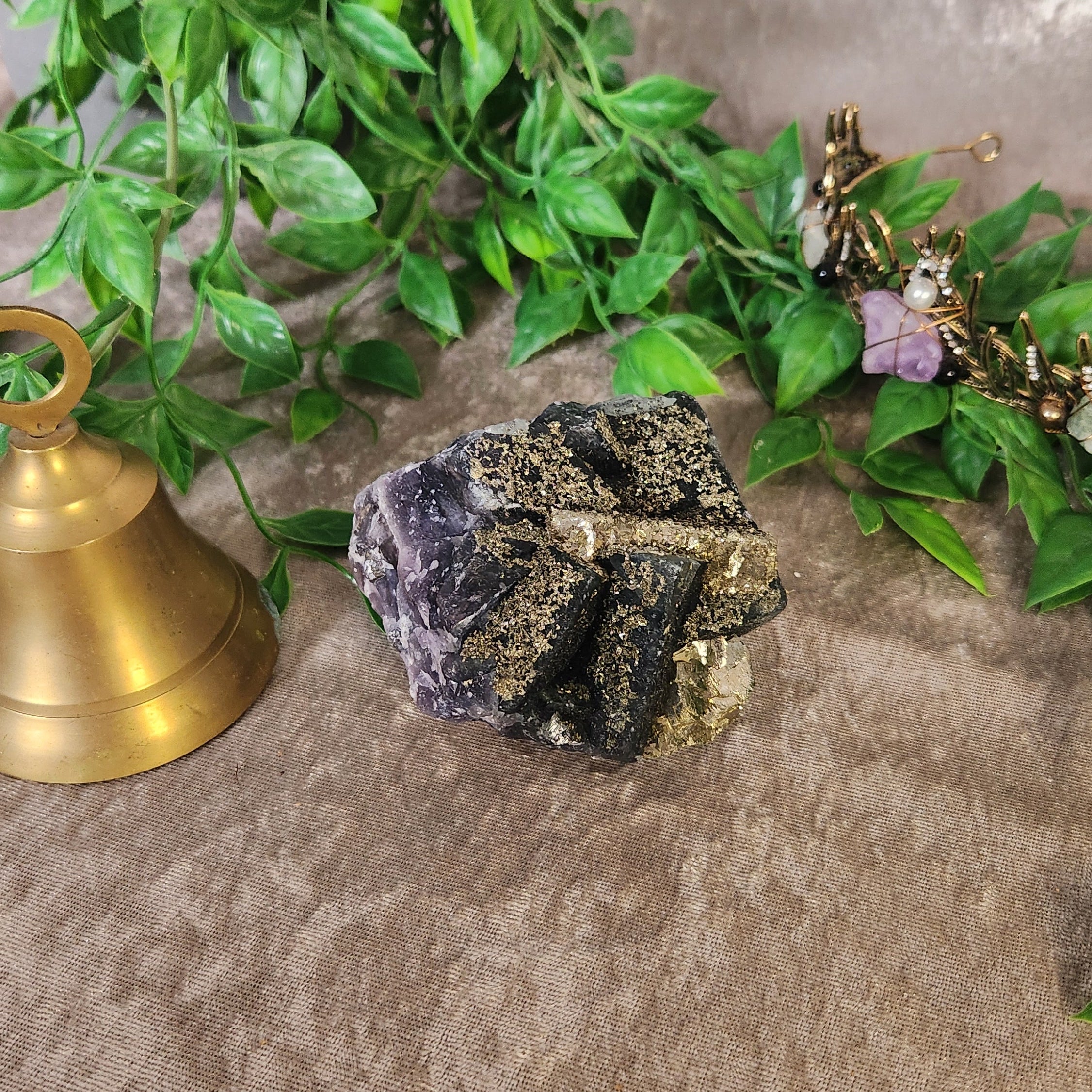 Raw fluorite specimen with sparkling pyrite inclusions