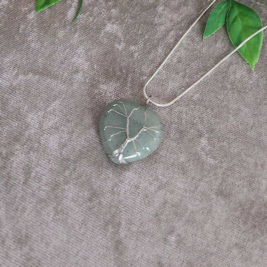 Green aventurine heart crystal necklace for growth and balance