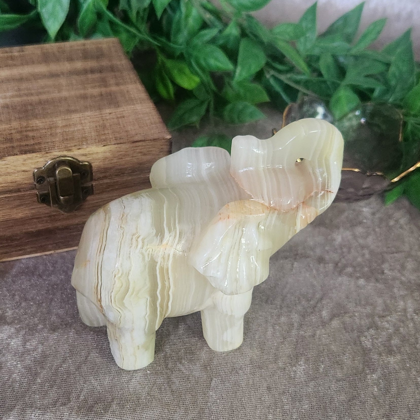 Green Onyx elephant stone carving symbol of strength and calm