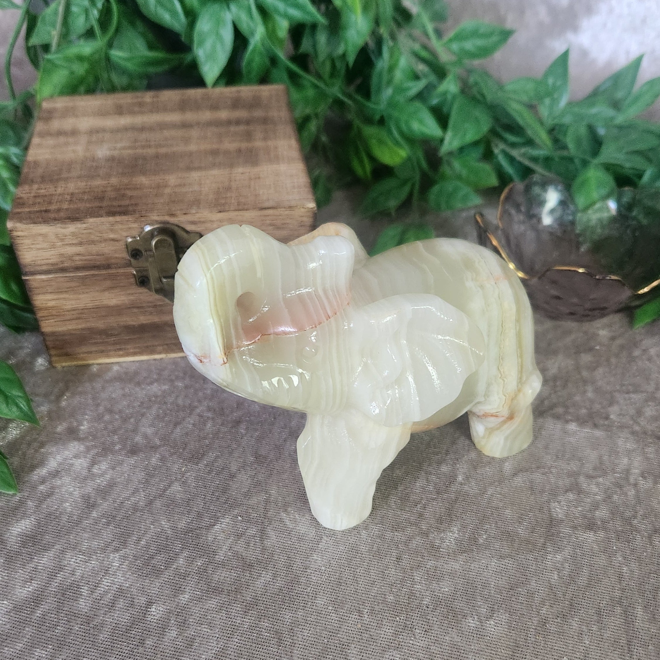Banded green onyx elephant hand carved - Spellbound Crystal Boutique