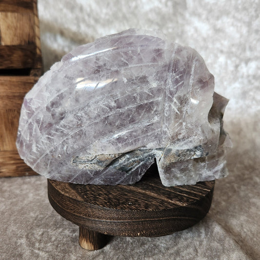 Large amethyst crystal skull with deep purple colouring
