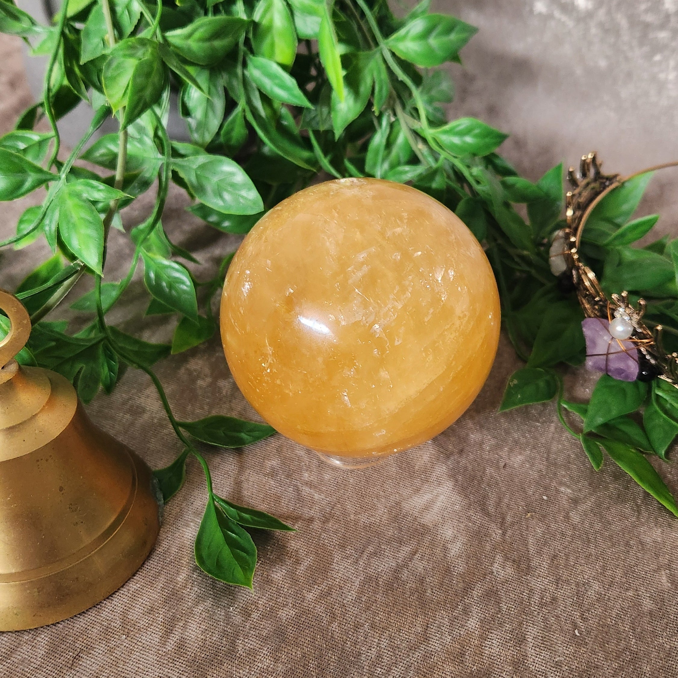 Golden Calcite sphere polished crystal for confidence and clarity