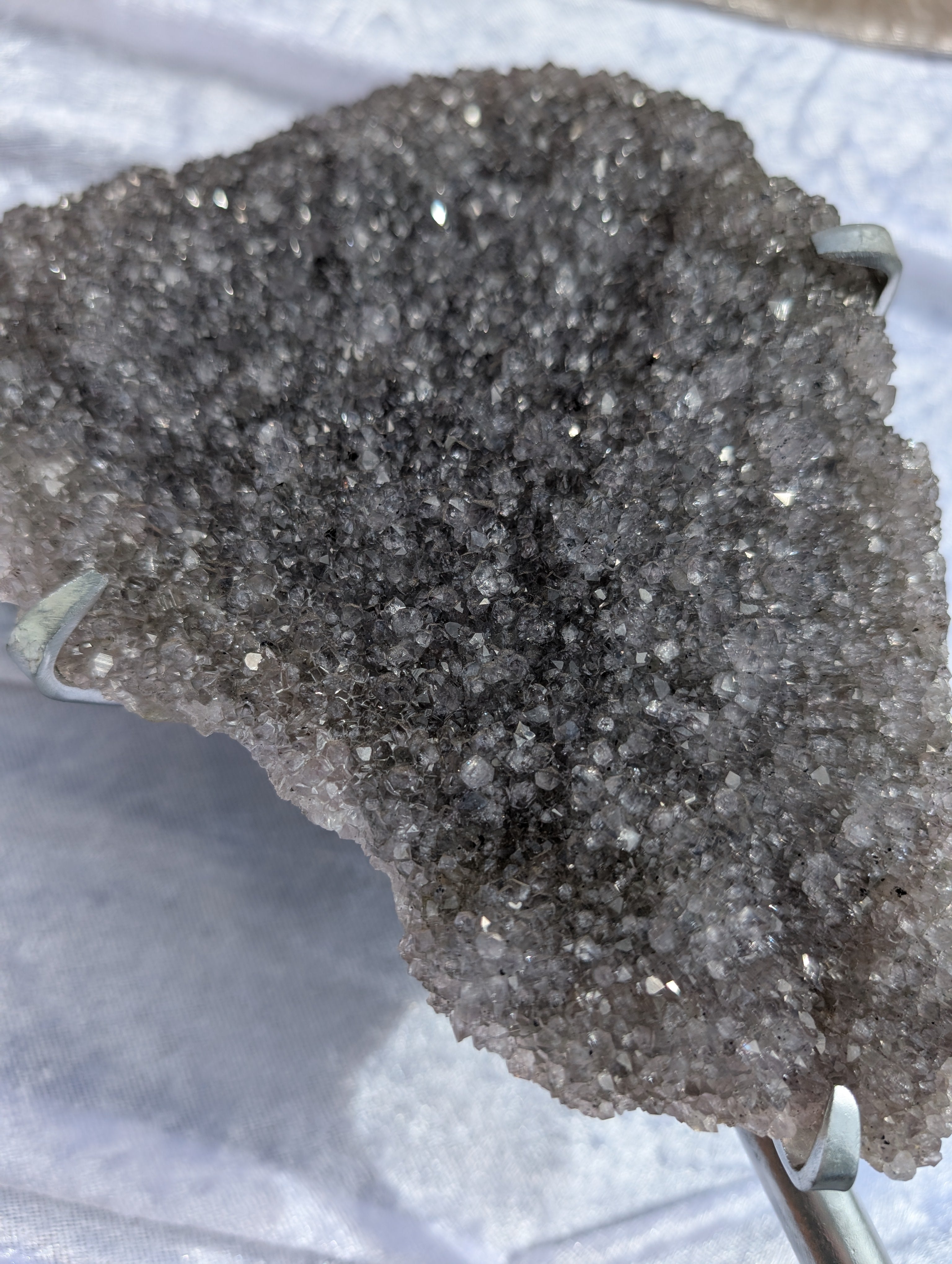 Close up of large black amethyst cluster statement piece