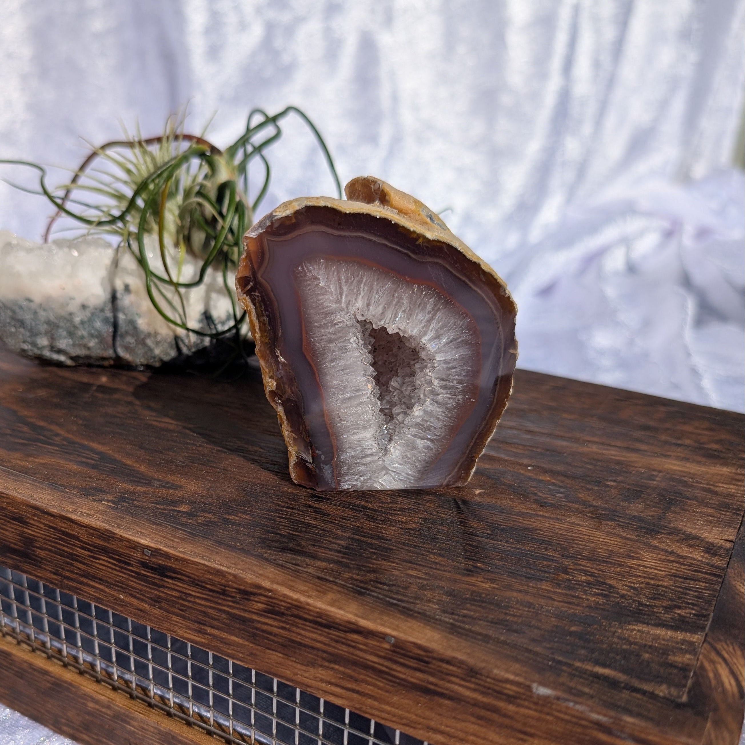 Natural Red Banded Agate displayed on vintage style wooden box 