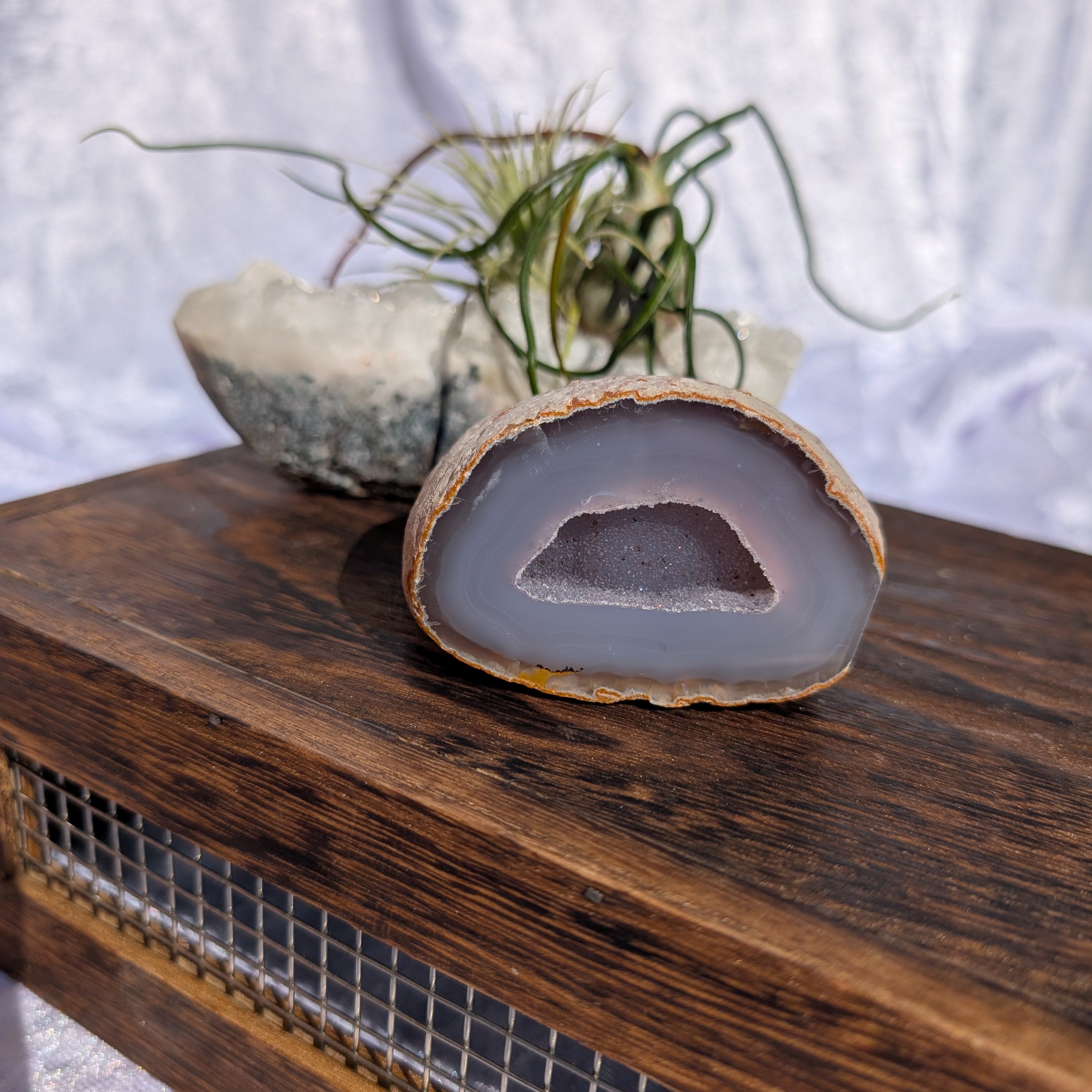grey druzy in agate with inclusions