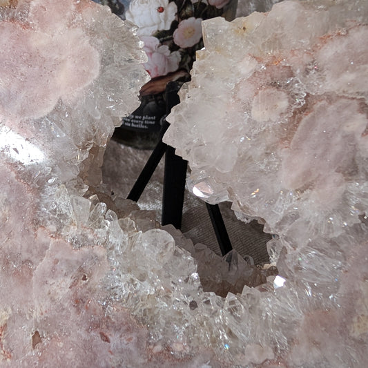 Pink amethyst heart crystal with soft blush tones and natural druzy texture