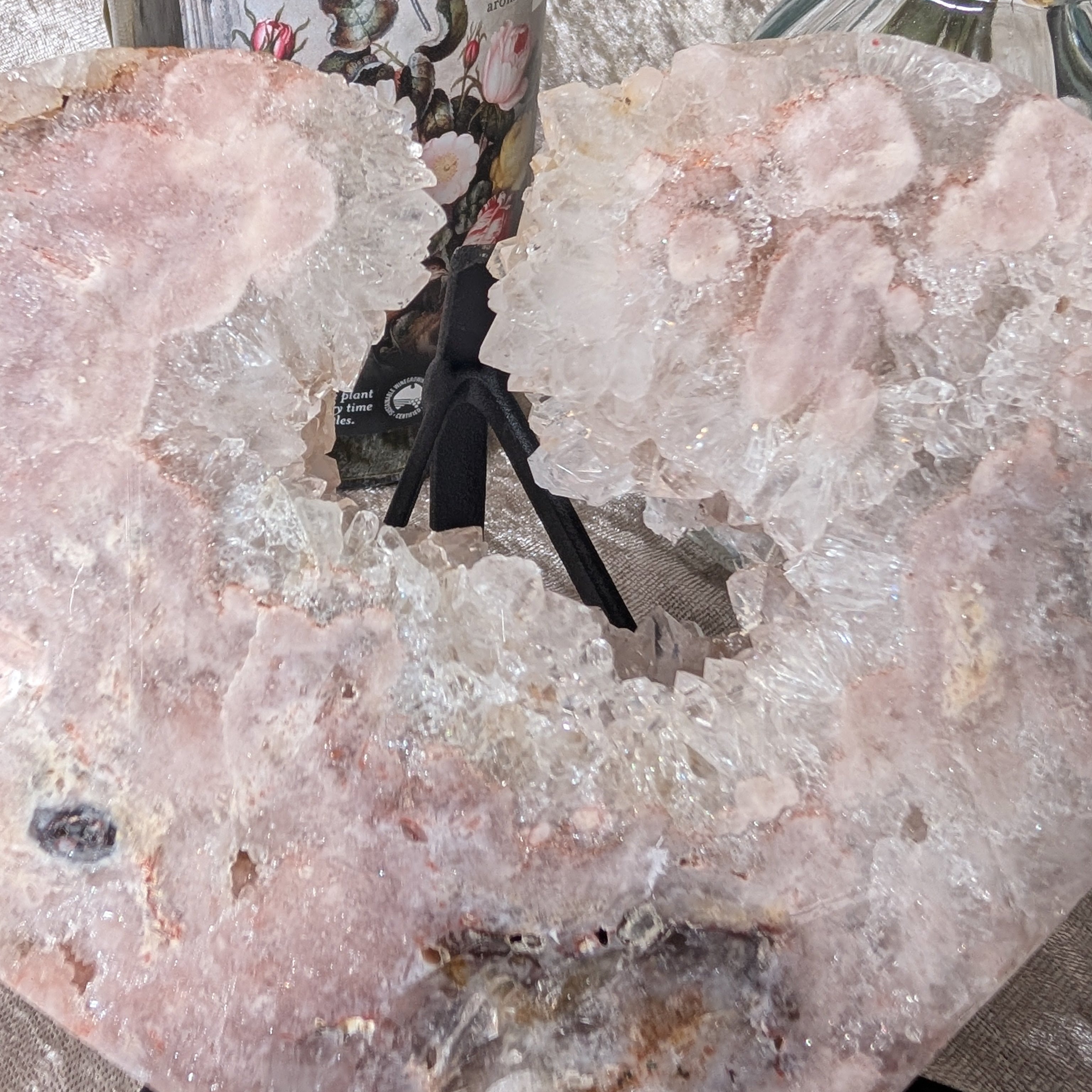 Close-up of pink amethyst heart showing delicate crystalline formations
