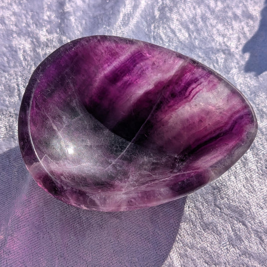 Purple fluorite crystal bowl used for intuition, meditation and mental clarity