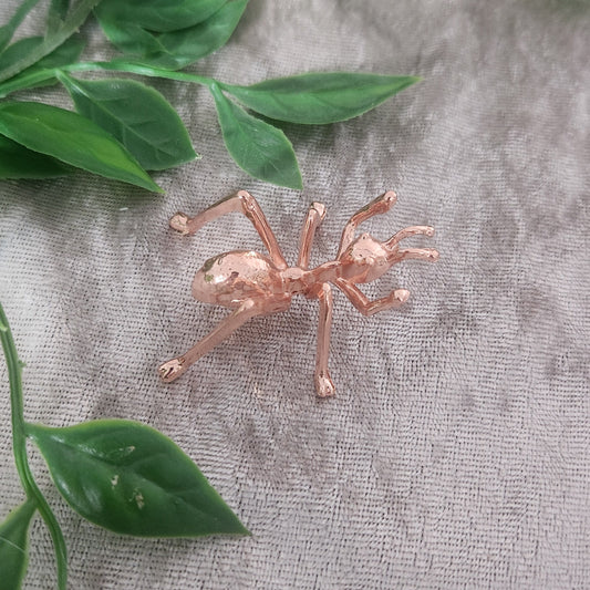 Rose Gold vull ant sphere holder with greenery on golden velvet