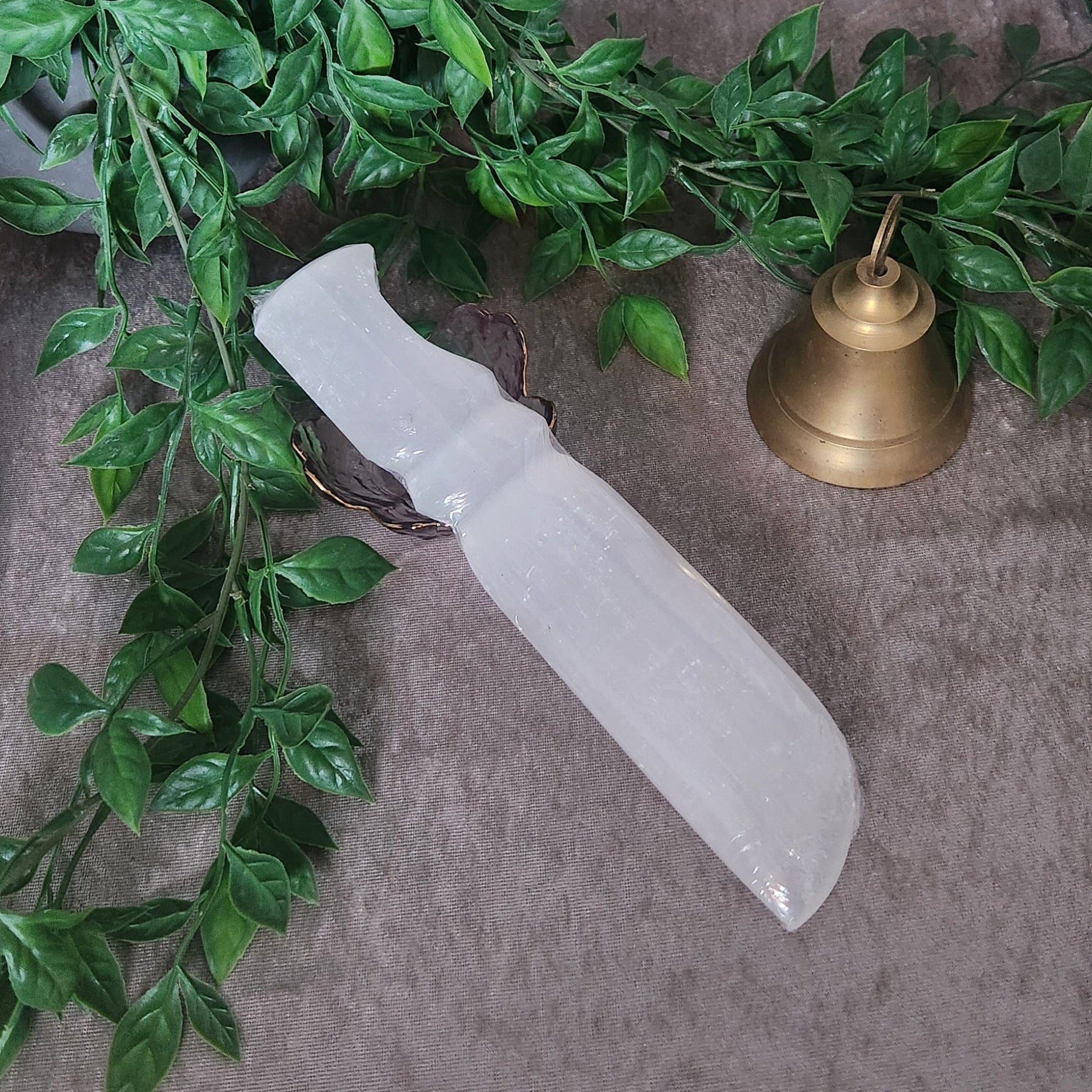 Selenite sword crystal used for energy cleansing and spiritual protection