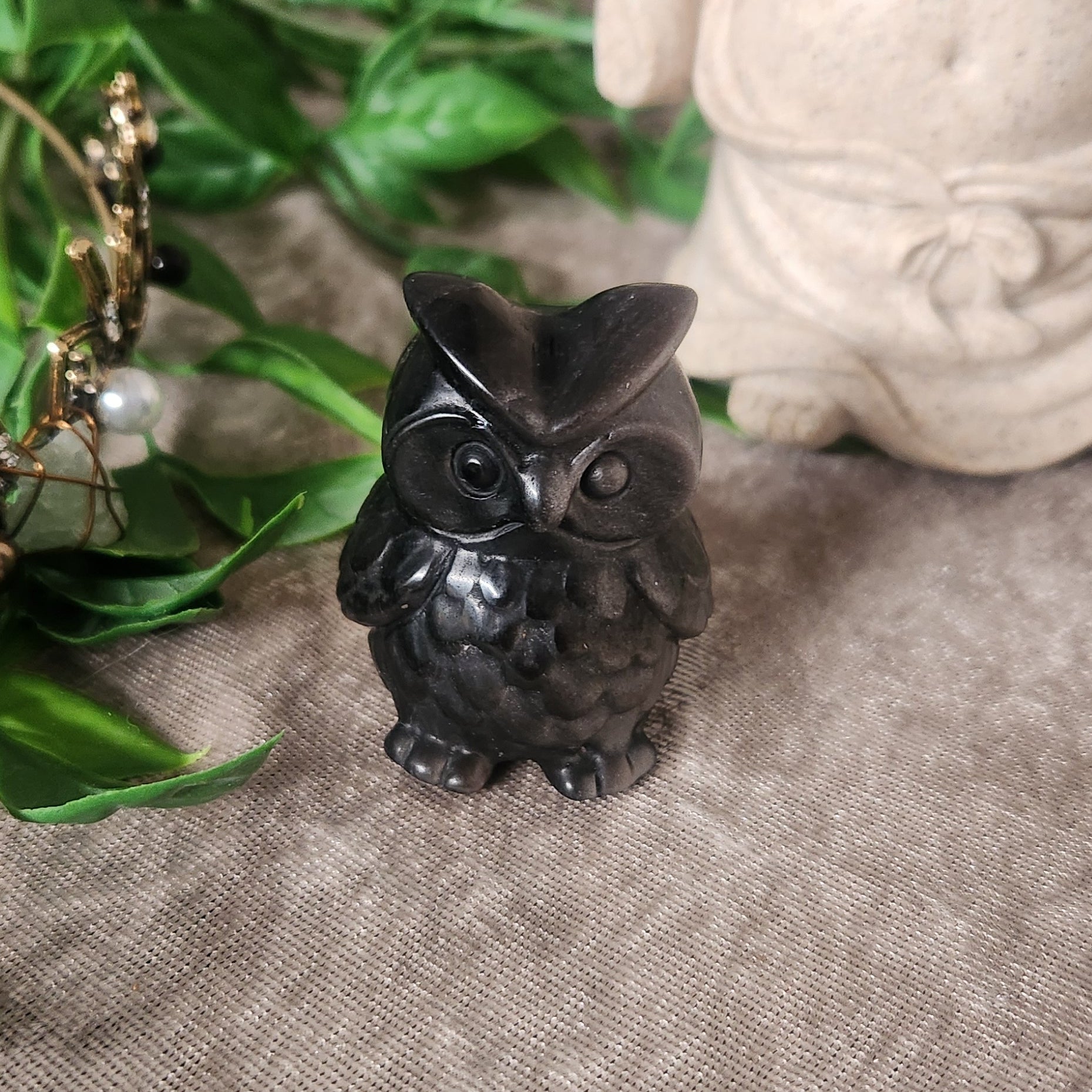 Silver obsidian hand carved owl with subtle metallic sheen
