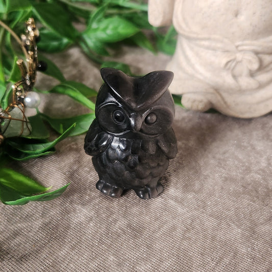 Silver obsidian hand carved owl with subtle metallic sheen