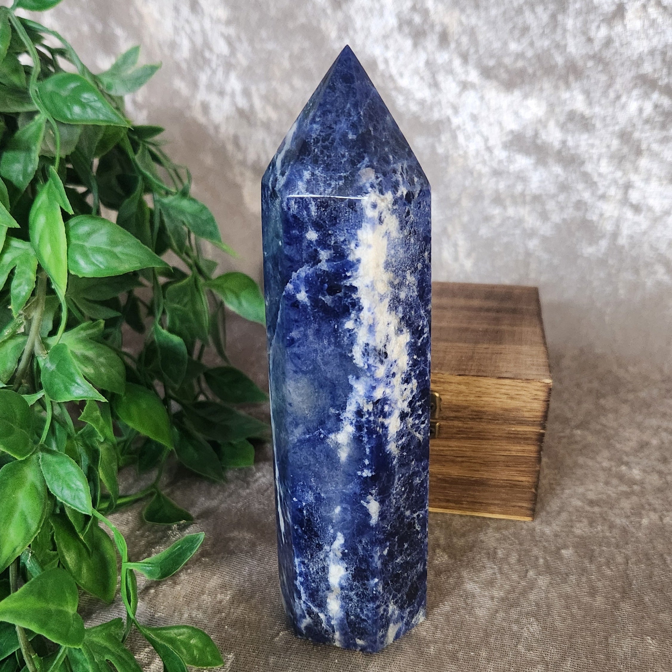 Sodalite crystal tower with deep blue colour and white veining
