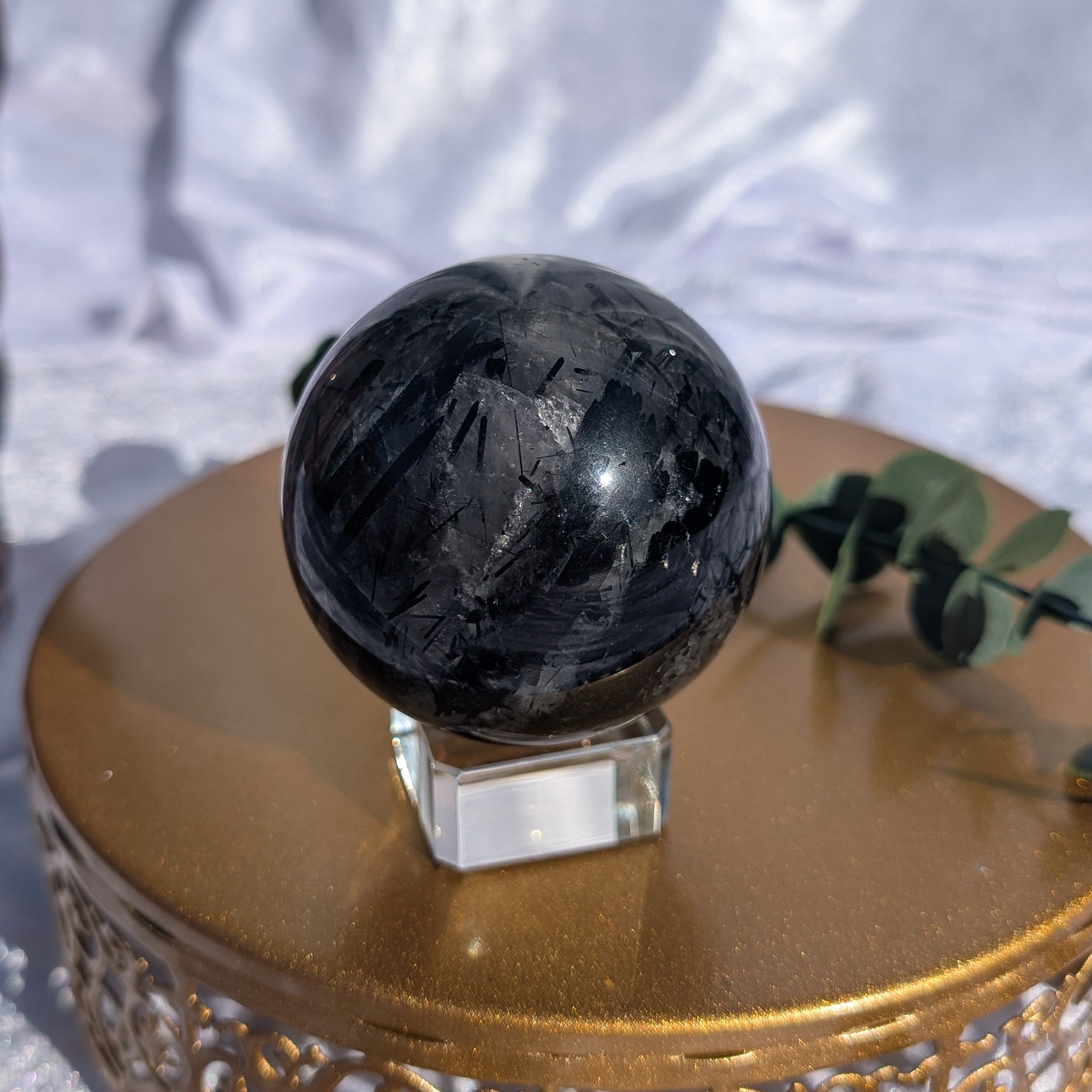 Tourmalinated Quartz sphere with natural black tourmaline inclusions