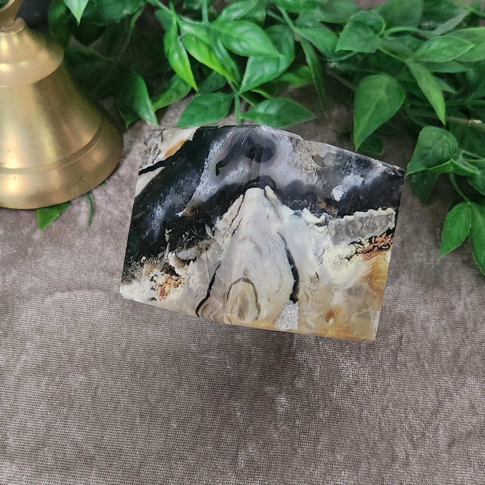 Geometric volcano agate cube carved and polished with earthy green tones