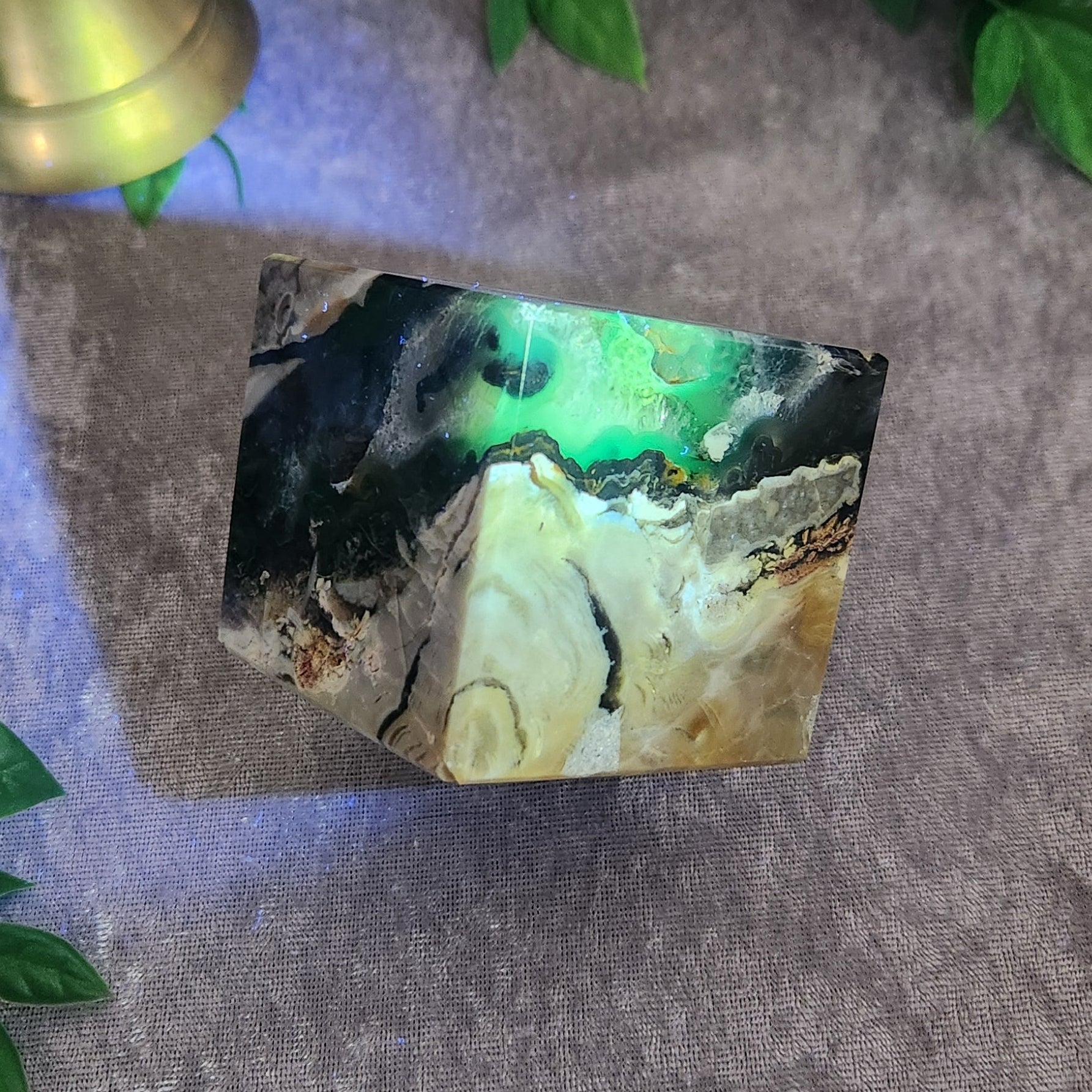 Hand cut volcano agate cube showcasing natural layers and grounding energy