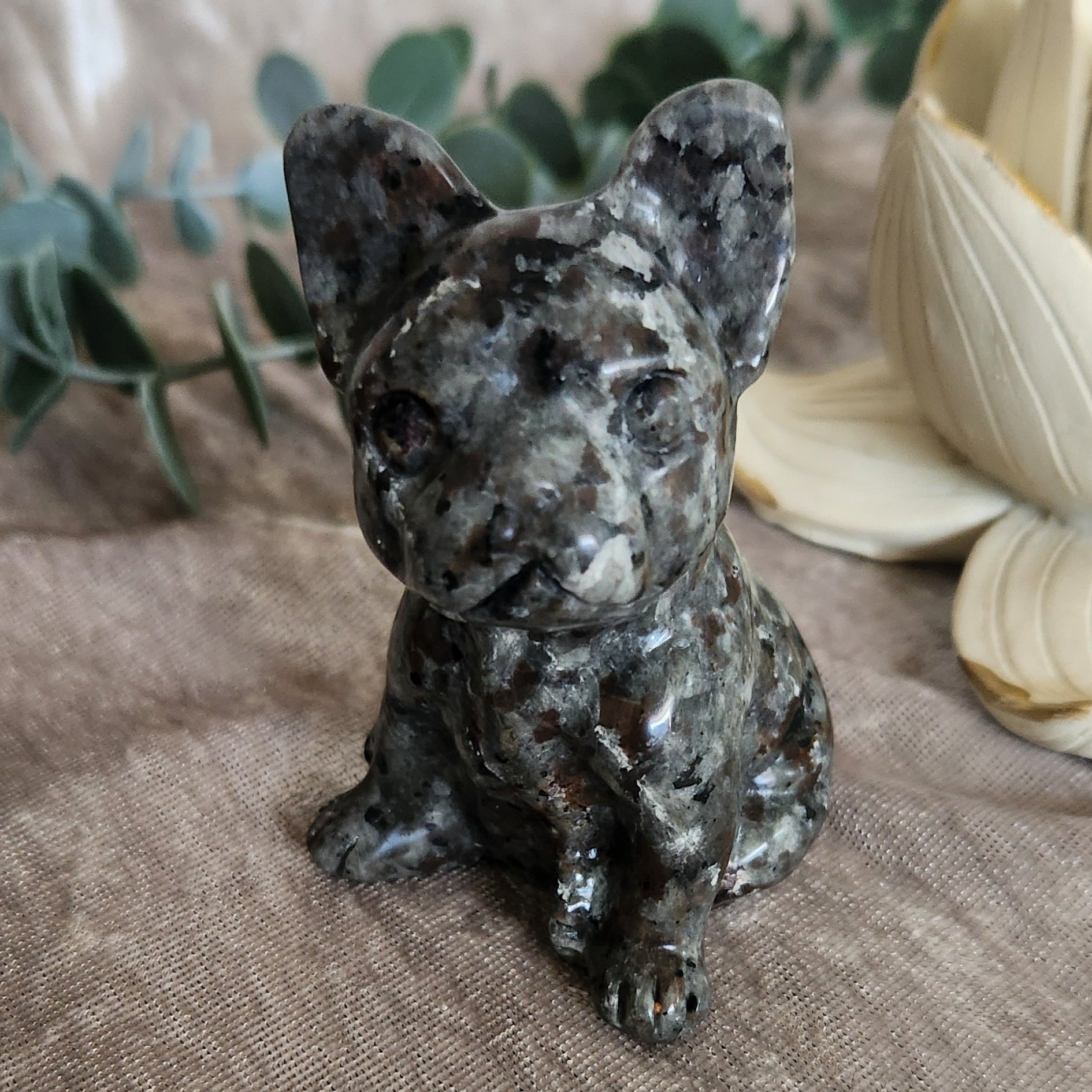 Yooperlite bulldog crystal carving showing natural fluorescent stone