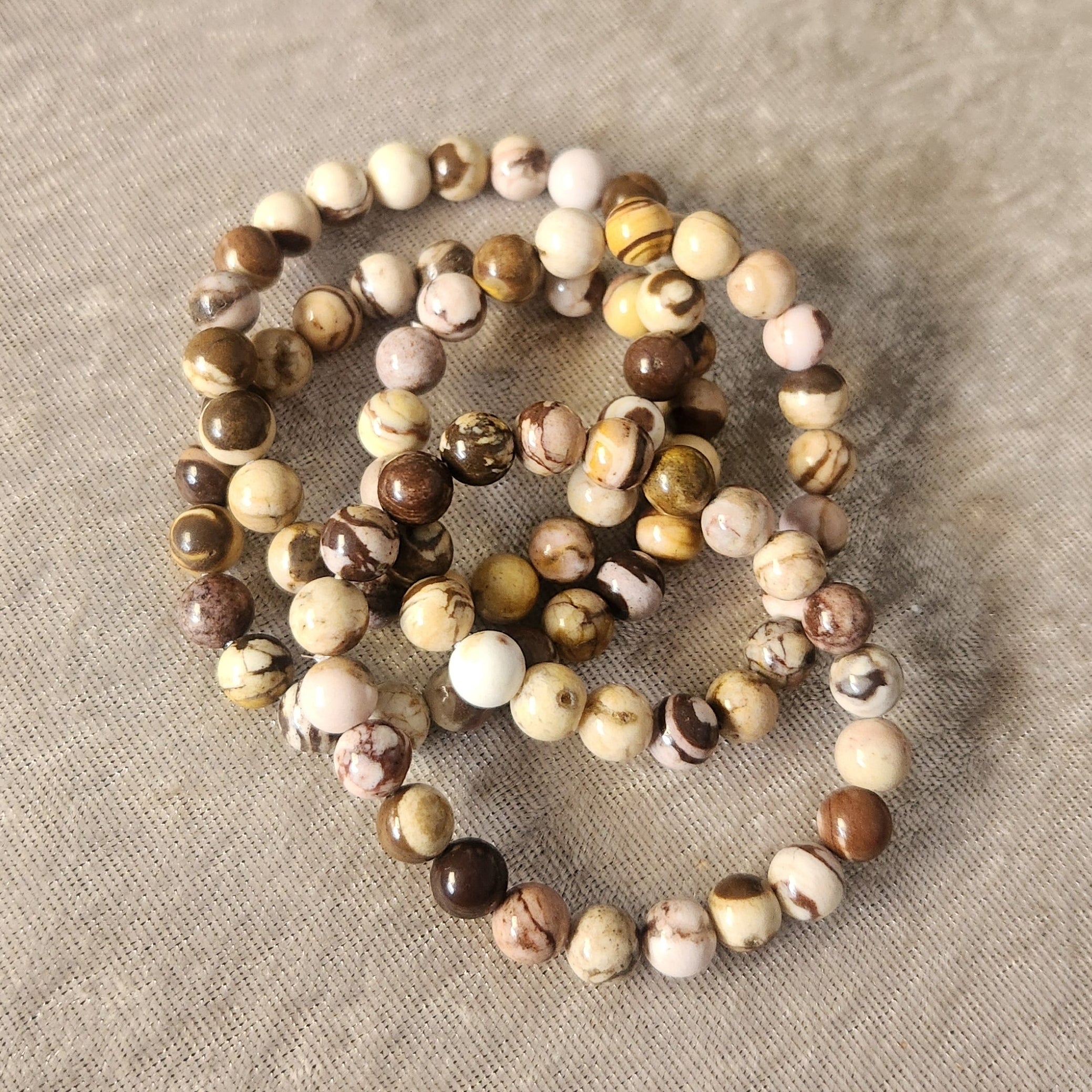 Natural Chocolate Calcite bracelet displayed on a neutral background