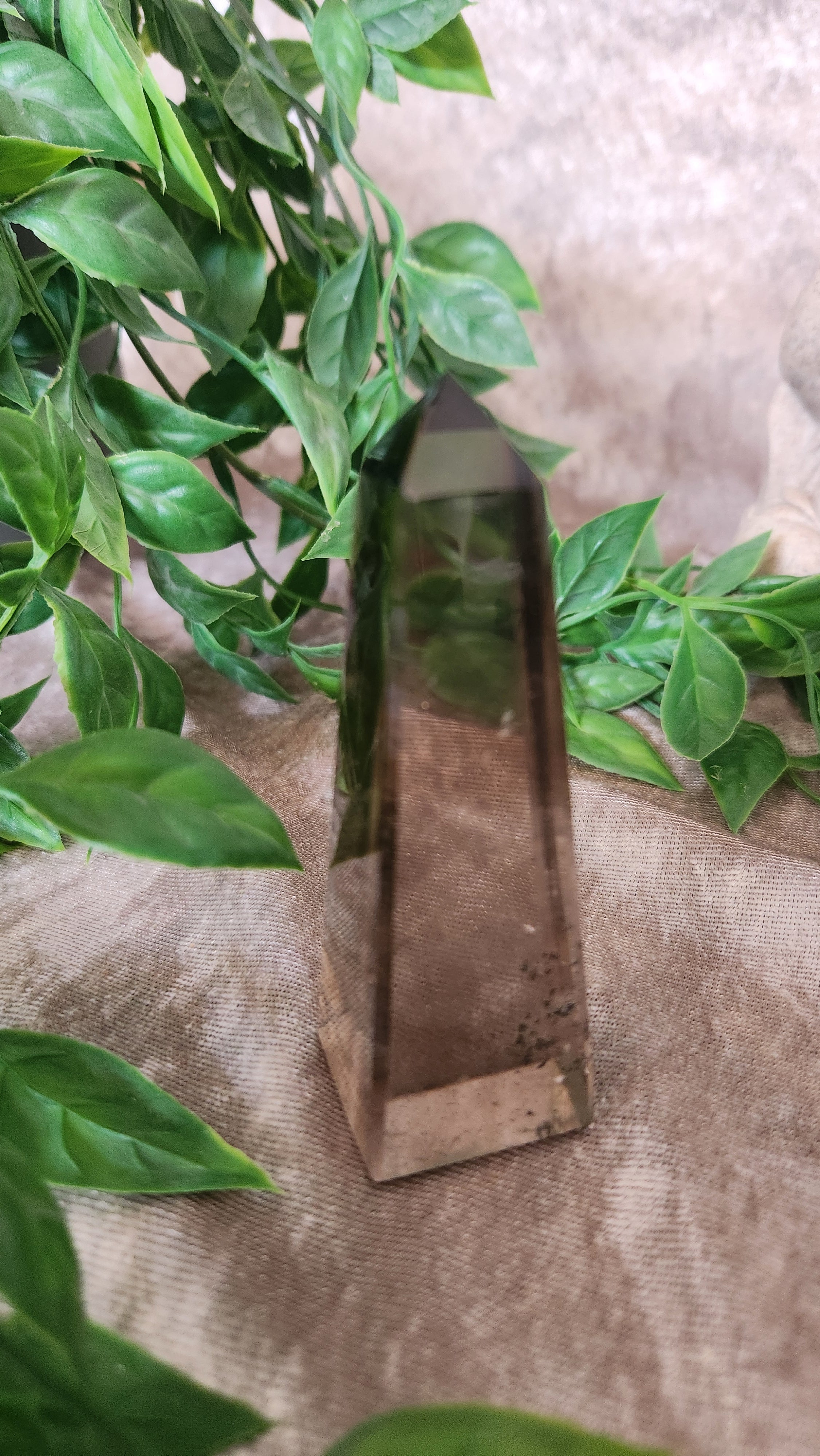 Smoky Quartz obelisk tower with natural clarity. Grounding crystal for protection, balance, and décor