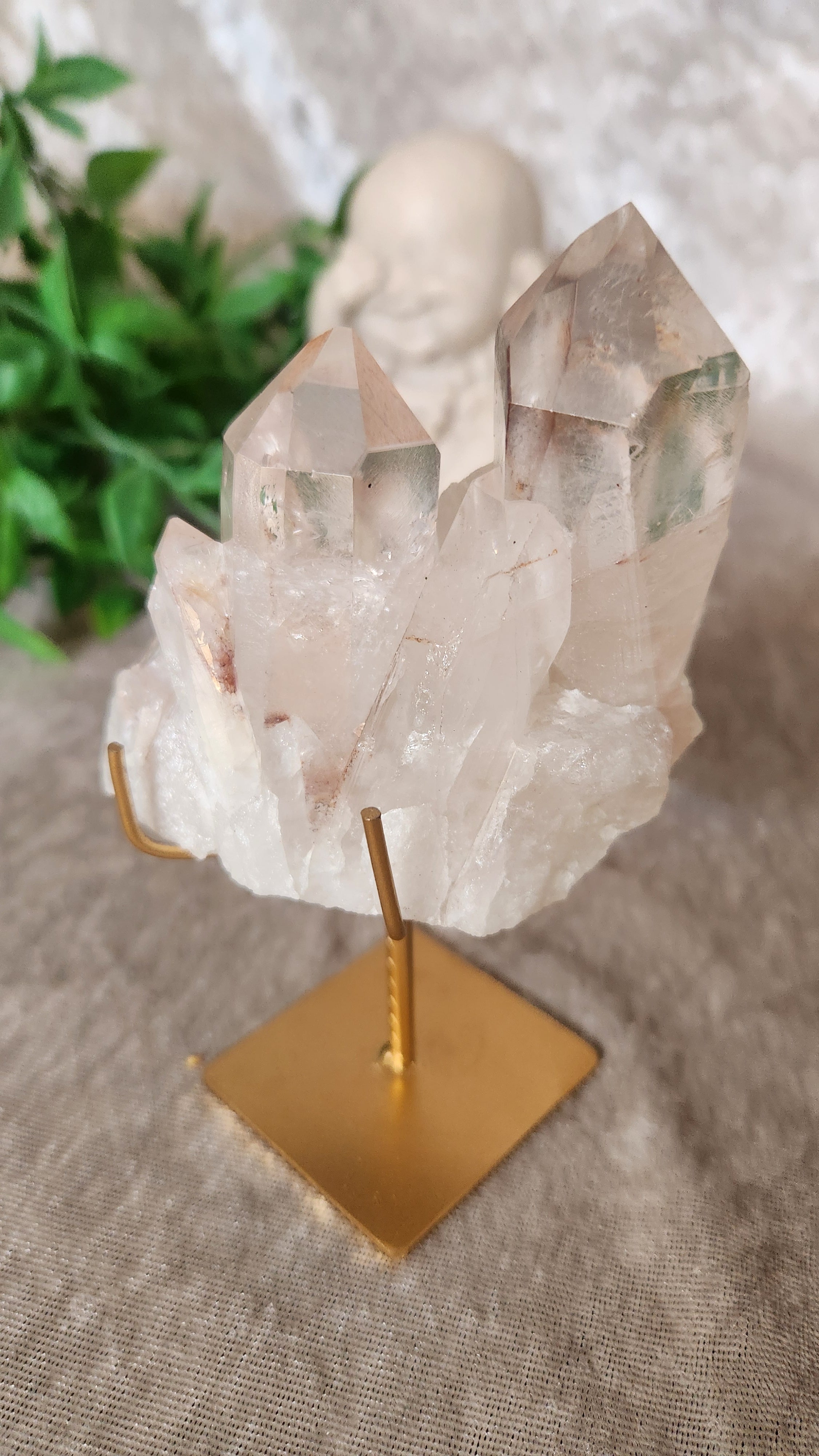 Himalayan Quartz cluster on gold stand. High vibration healing crystal and elegant boho luxe décor