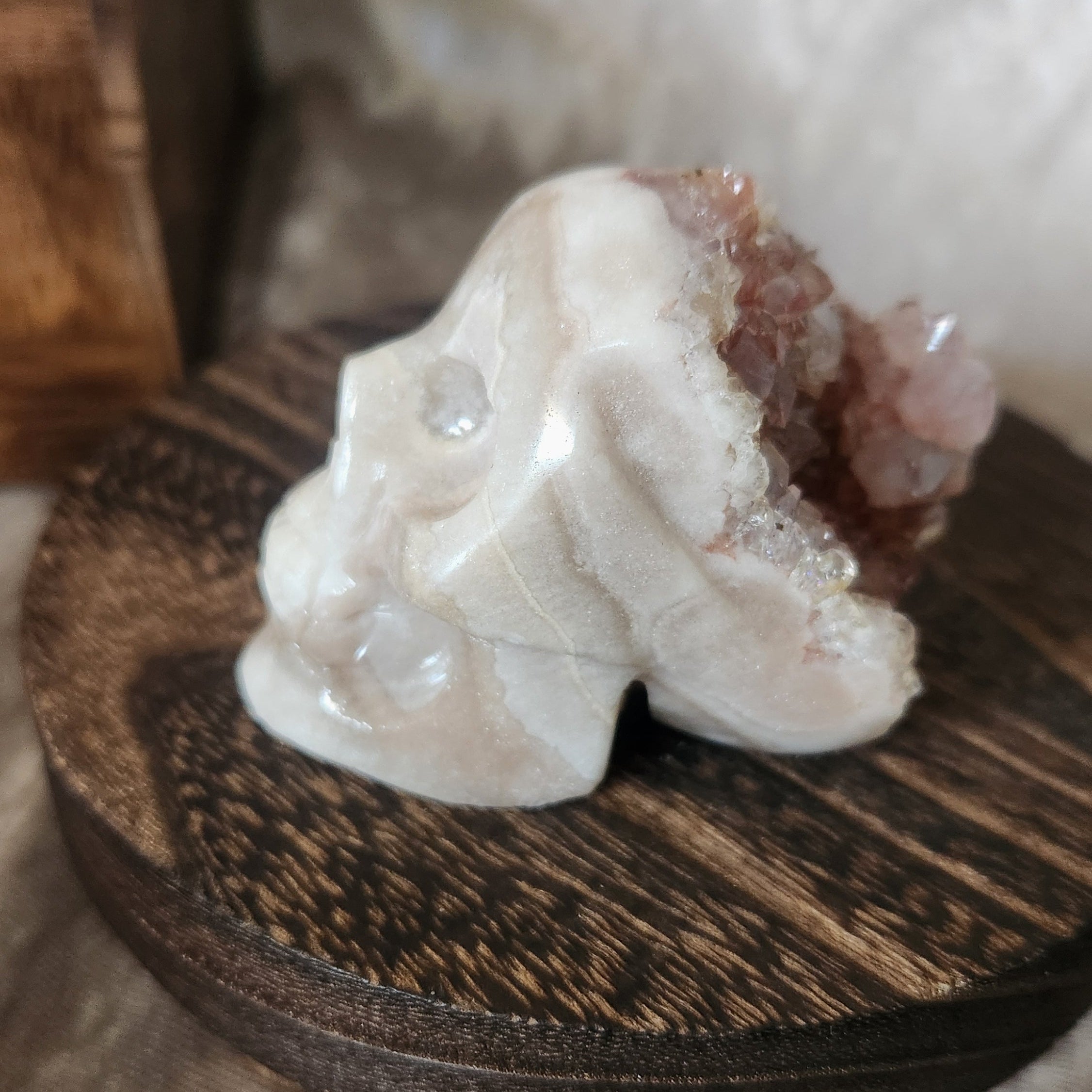 Brazilian pink amethyst skull with druzy crystal surface